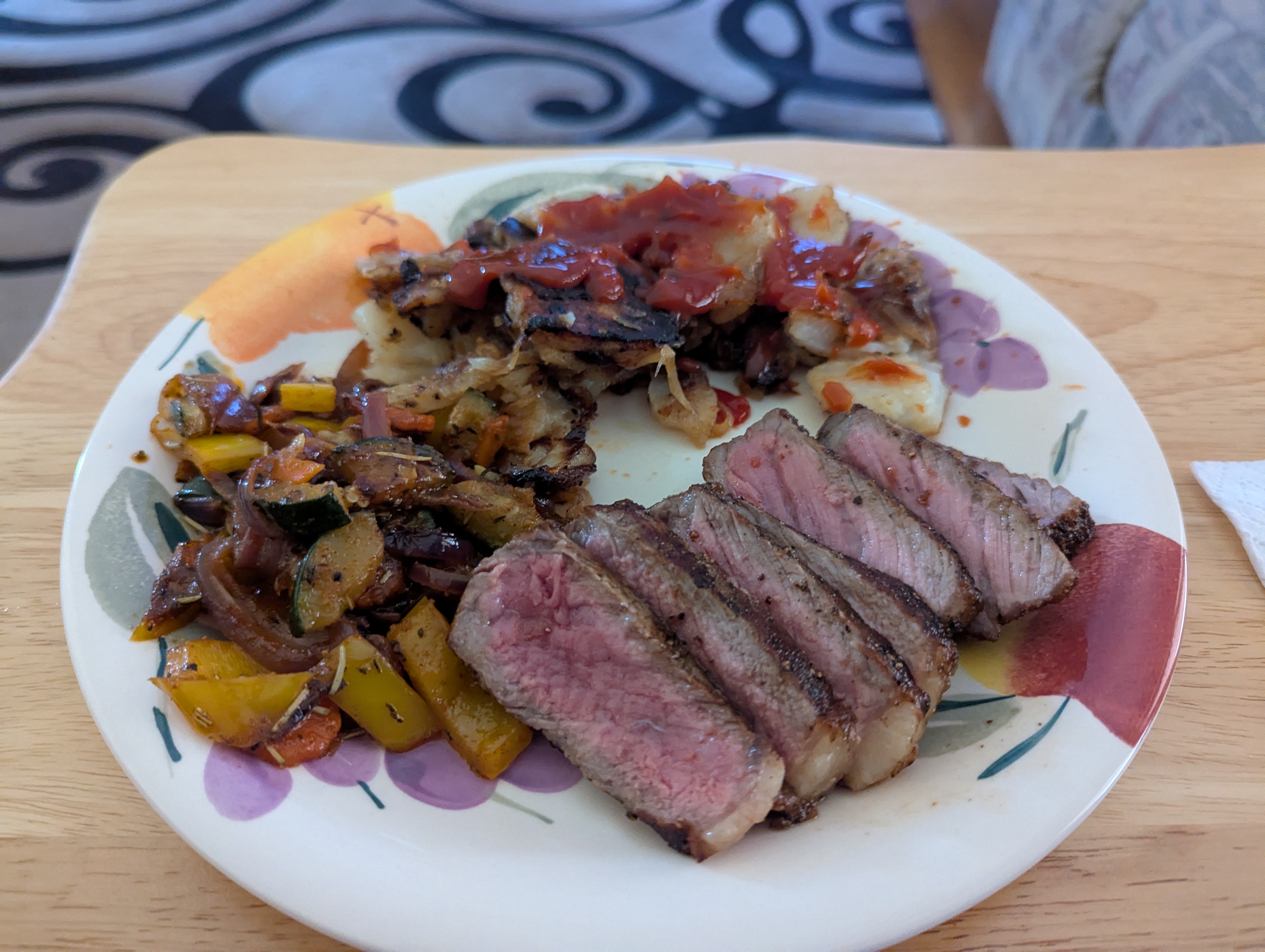 Indulge in New York Strip with Fried Potatoes and Stir-Fried Veggies