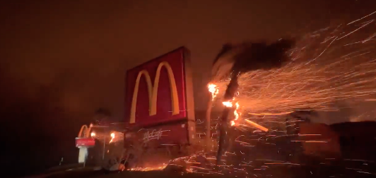 McDonald's Amidst the Wildfire: A Surreal Scene