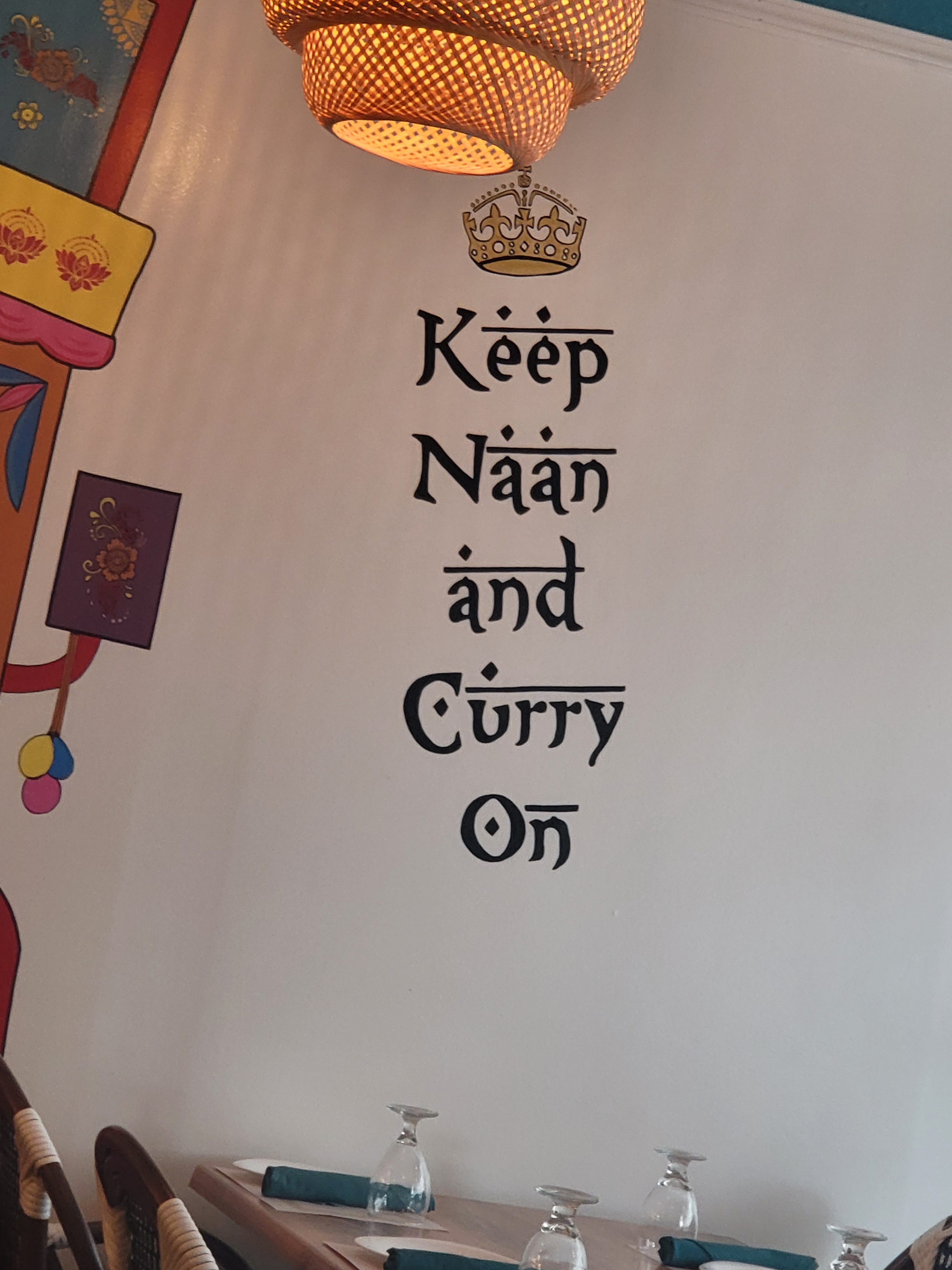 A Quirky Find on the Wall of My Favorite Indian Restaurant
