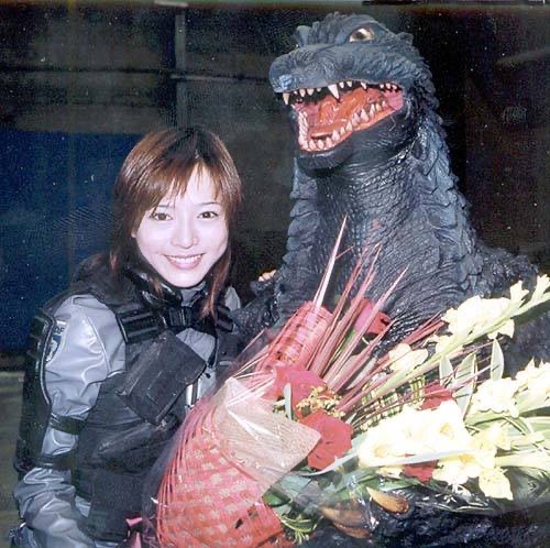 Yumiko Shaku, known as Akane in Godzilla Against Mechagodzilla, sharing a joyful moment with a very happy Godzilla.