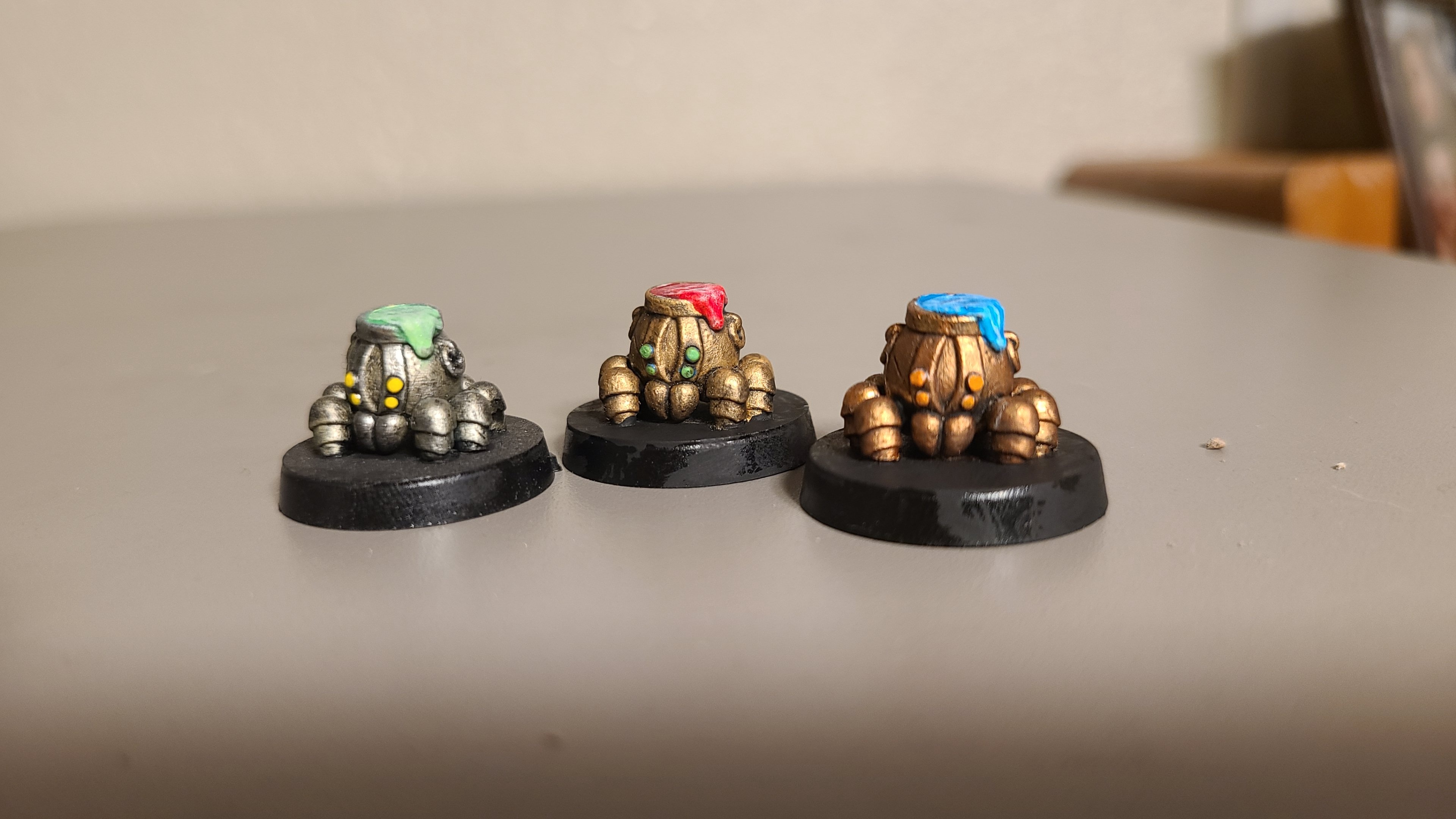 Check Out These Clockwork Cauldron Spiders I Painted for DnD!