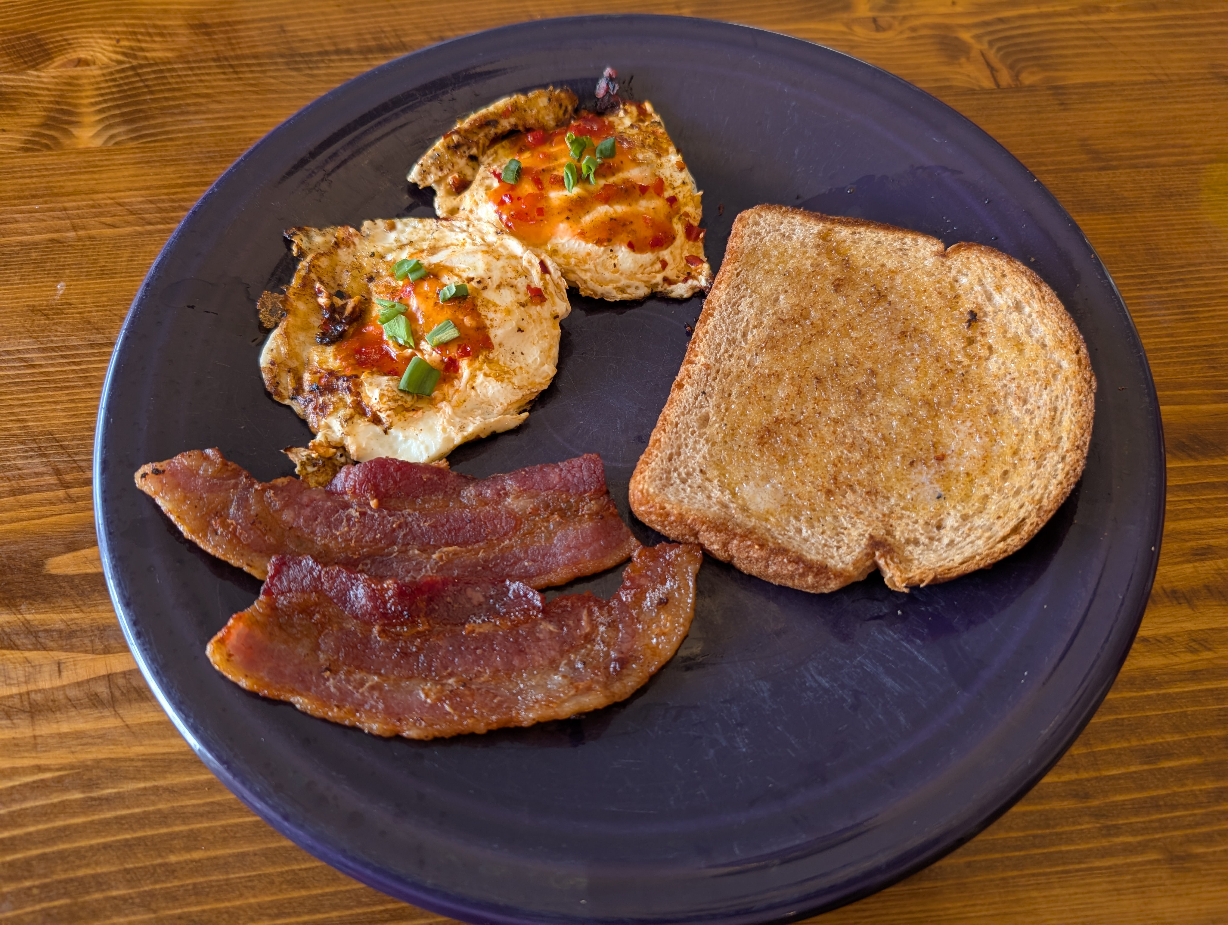 Delicious Fried Eggs Enhanced with Sambal Oelek