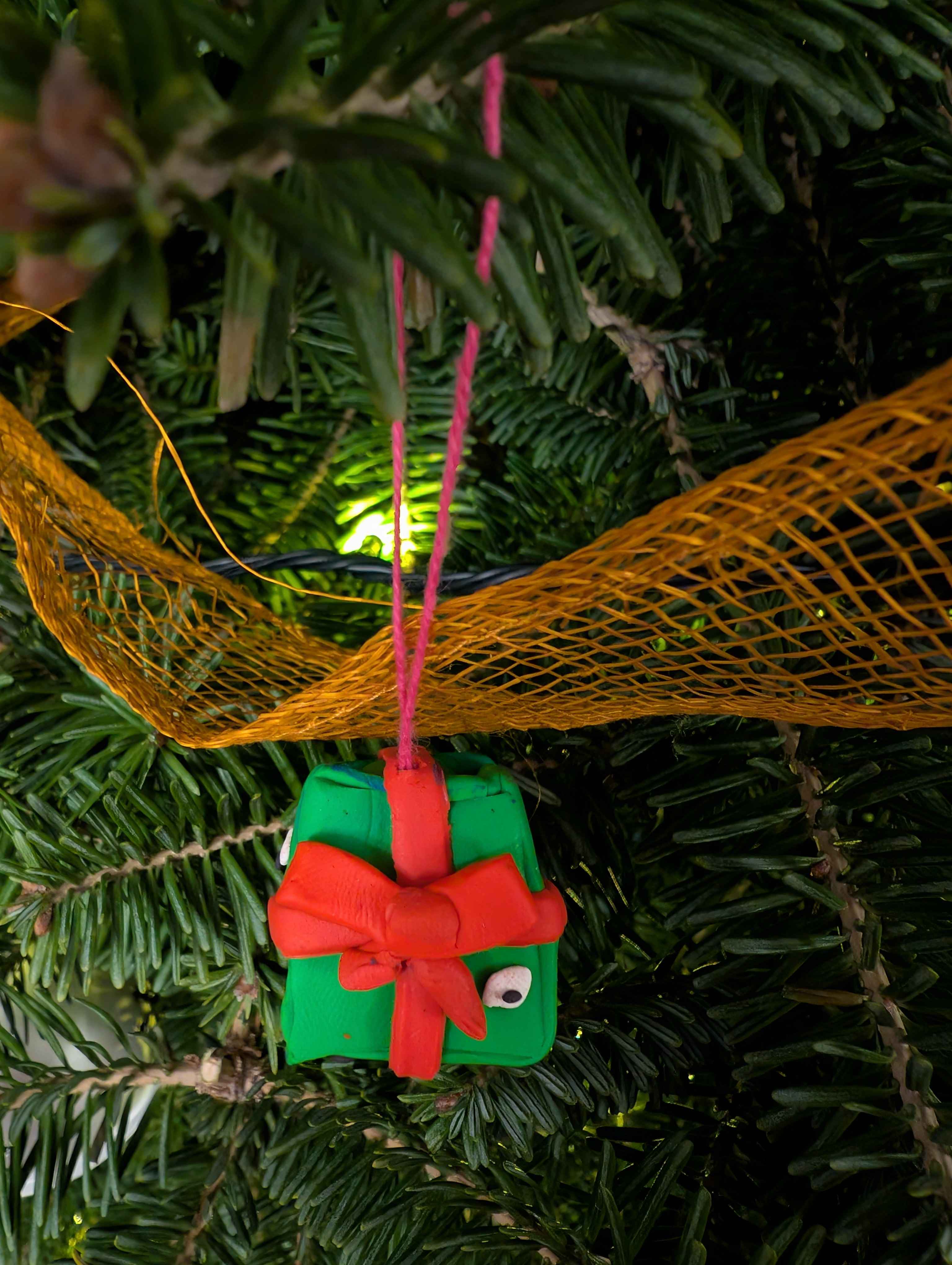 A whimsical mimic of a Christmas tree ornament