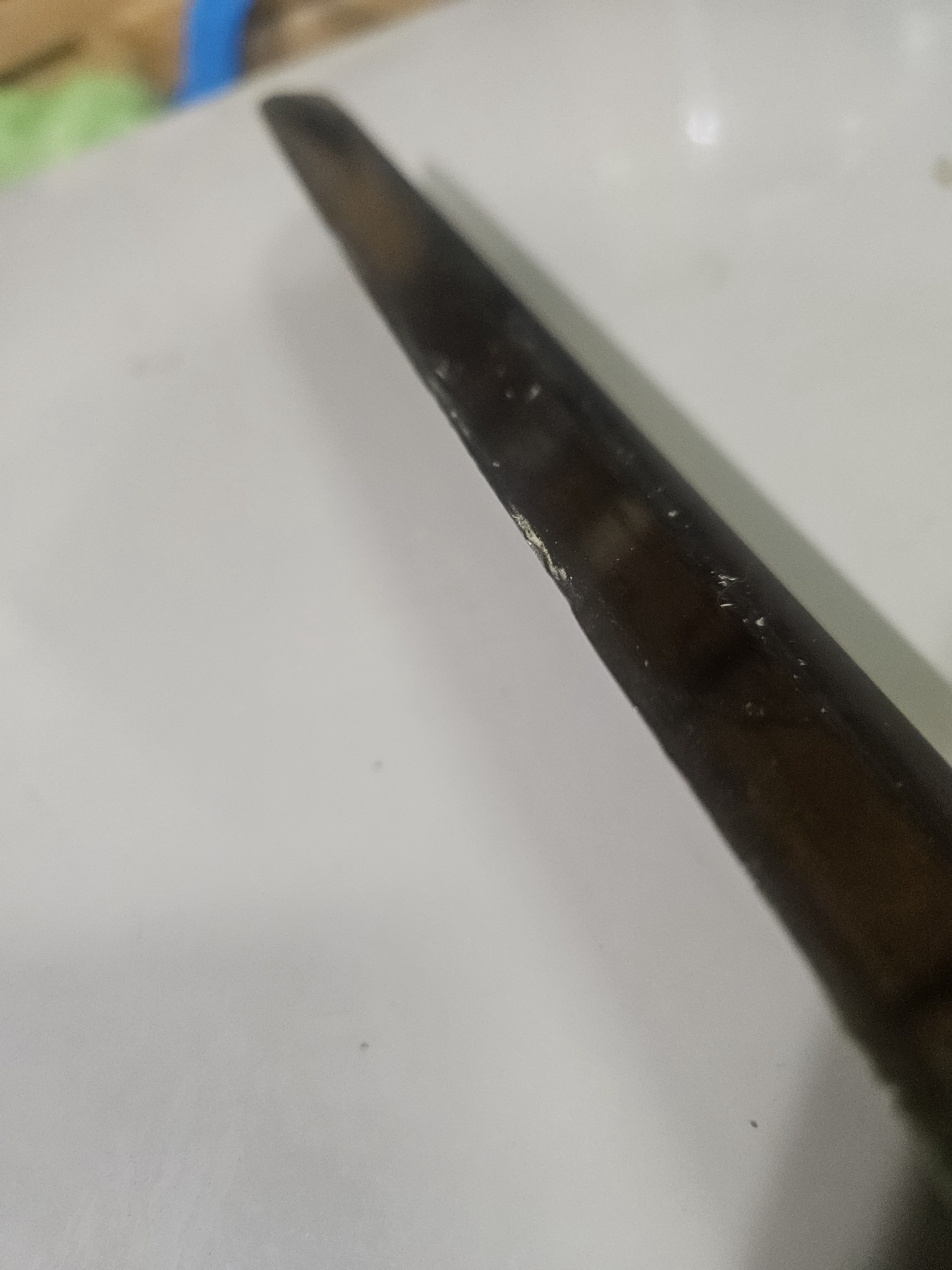 The Battle-Worn Sword with a Dented Edge