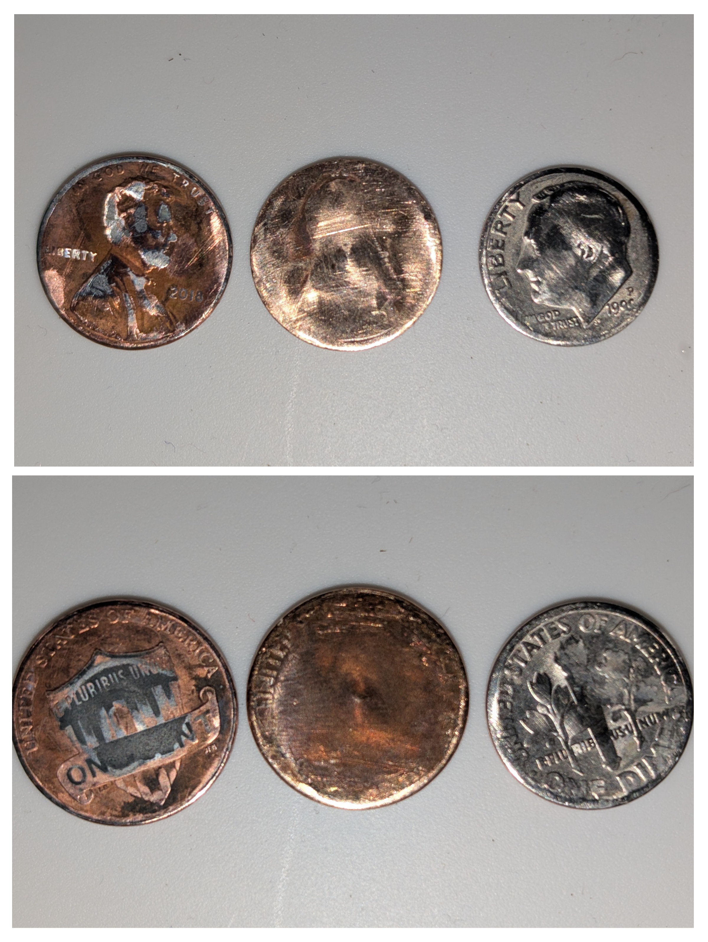 Two coins stuck in my washer for over a year, plus one from a few months back