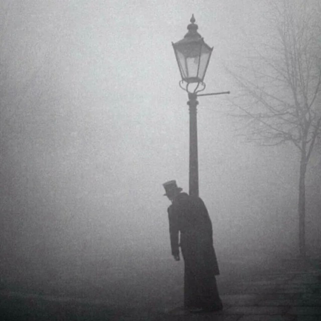 A Tipsy Gentleman in a Top Hat Clings to a Lamp-Post in 1934 London
