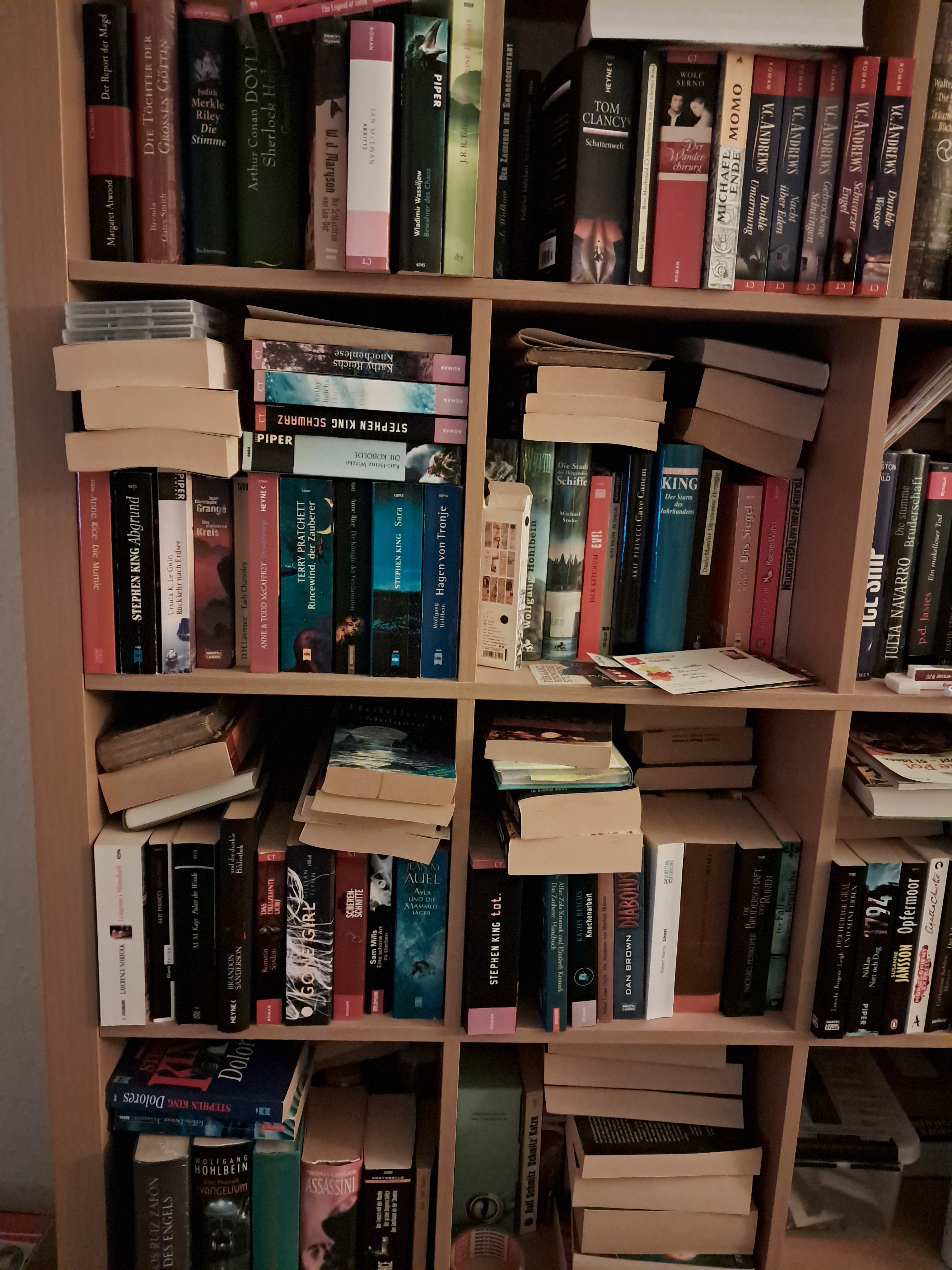 My hobby? Collecting books without the motivation to organize them on the shelf.