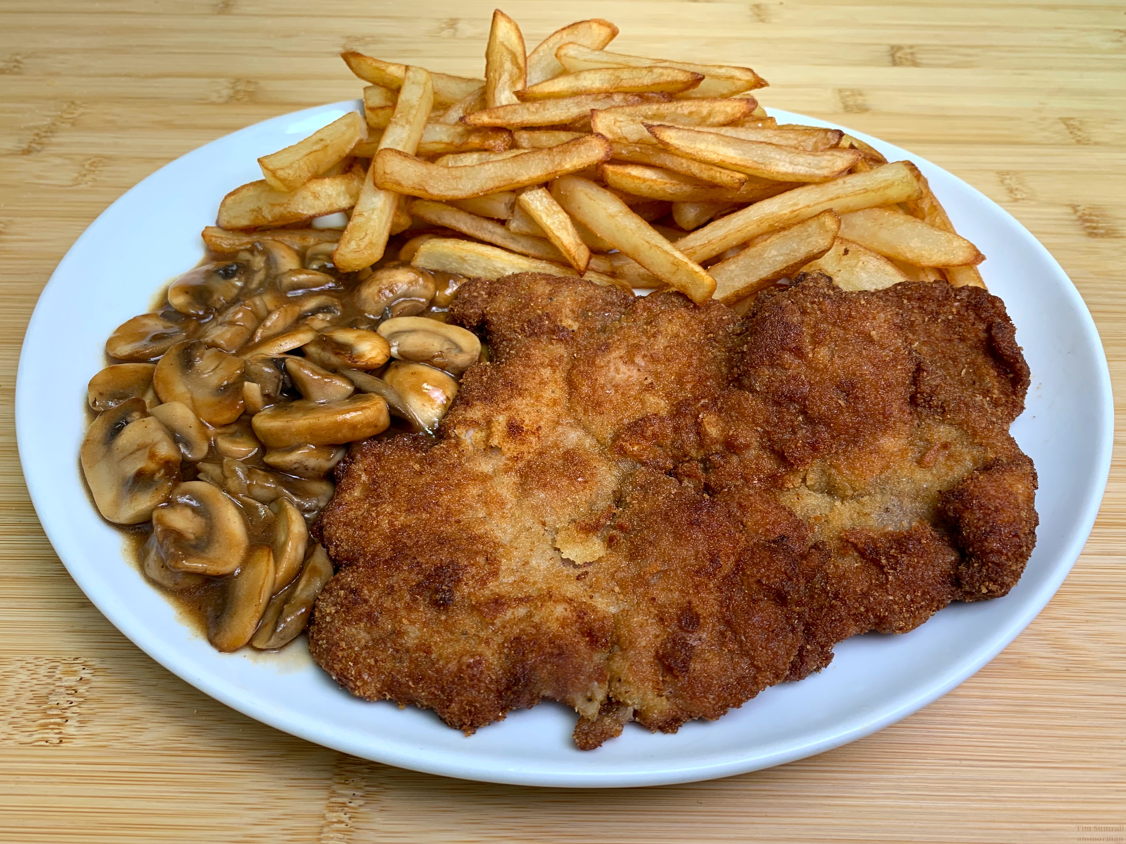 Savoring Schnitzel with Fries and Mushrooms