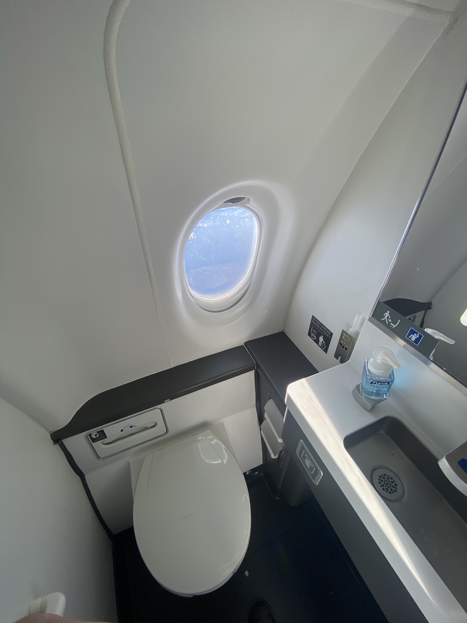This Plane's Bathroom Has a Window? What Were They Thinking!