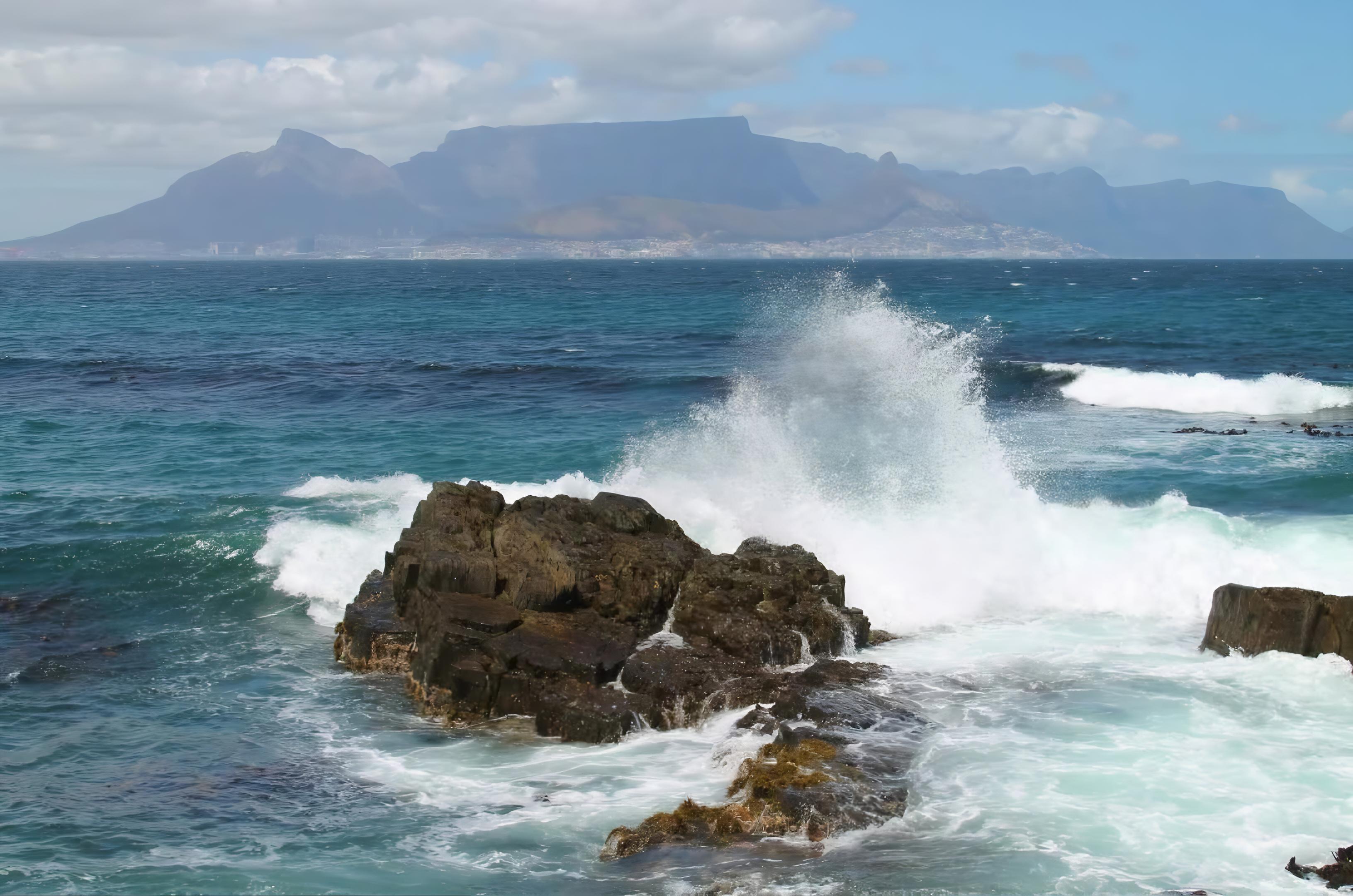 Which is truly more majestic: the crashing waves or the towering mountains?