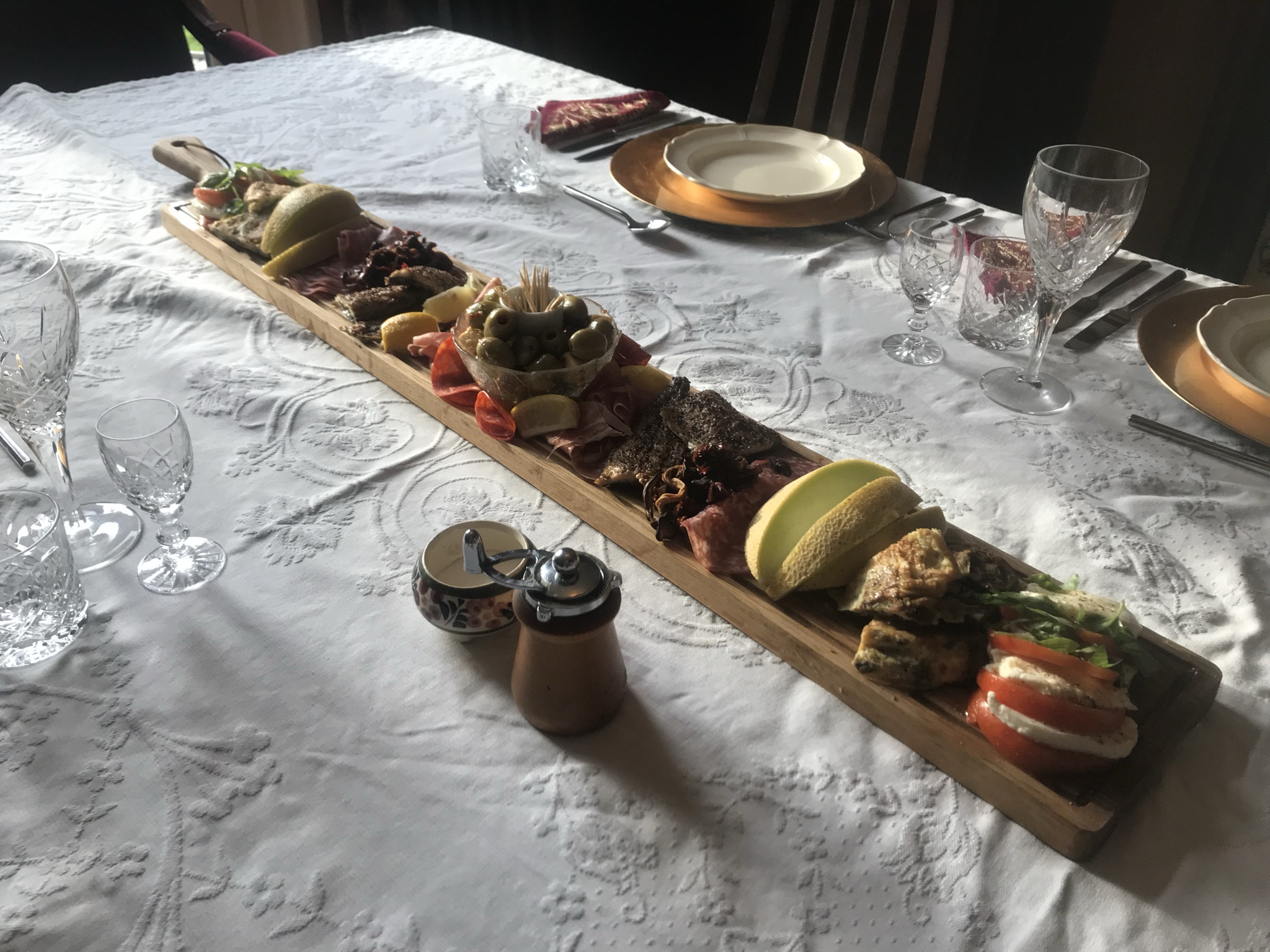 Feasting on an Italian antipasti board before diving into pasta.