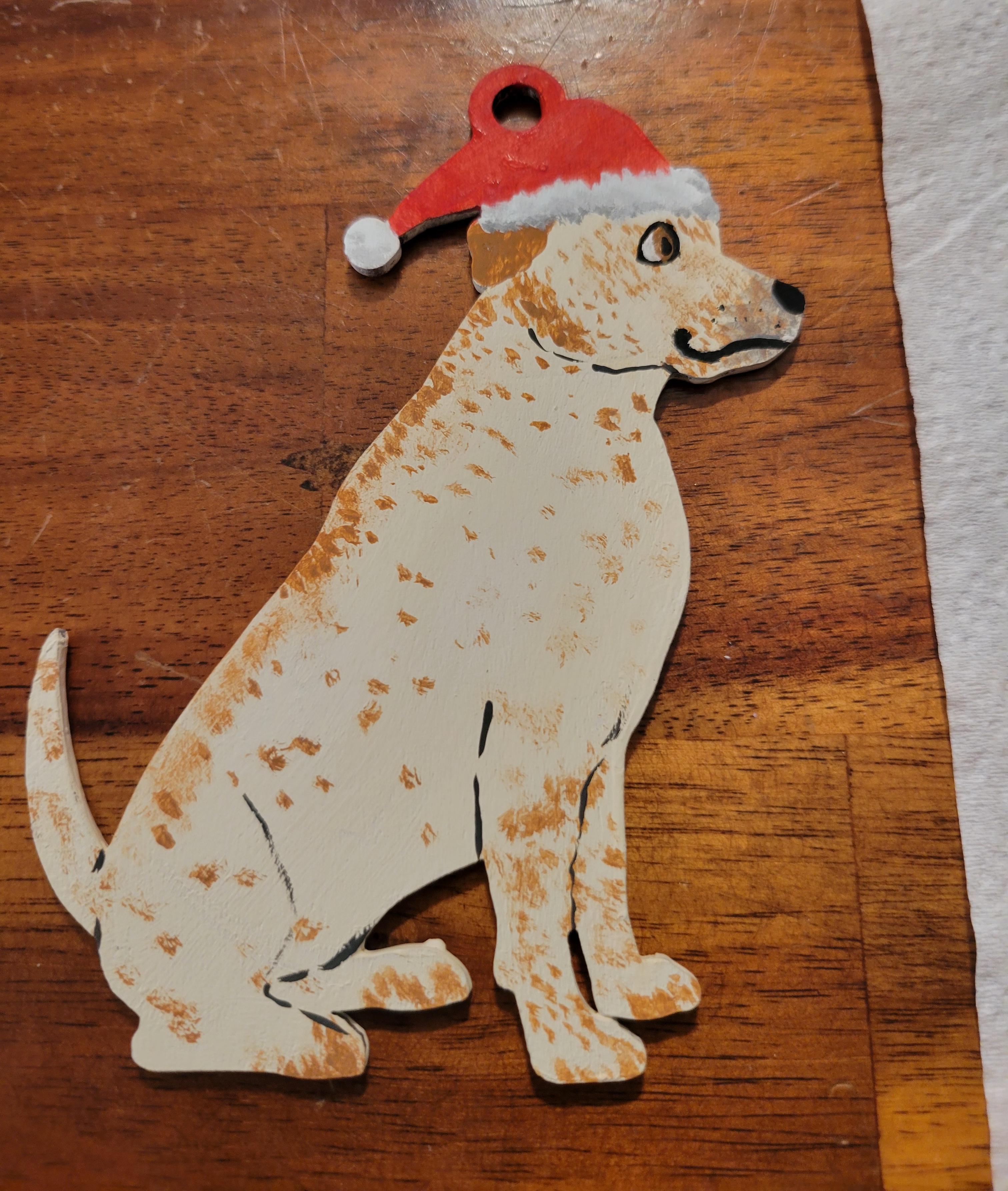 I crafted a special ornament featuring my dog.
