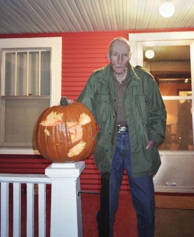 William S. Burroughs with His Hatchet-Carved Jack-O'-Lantern, 1996