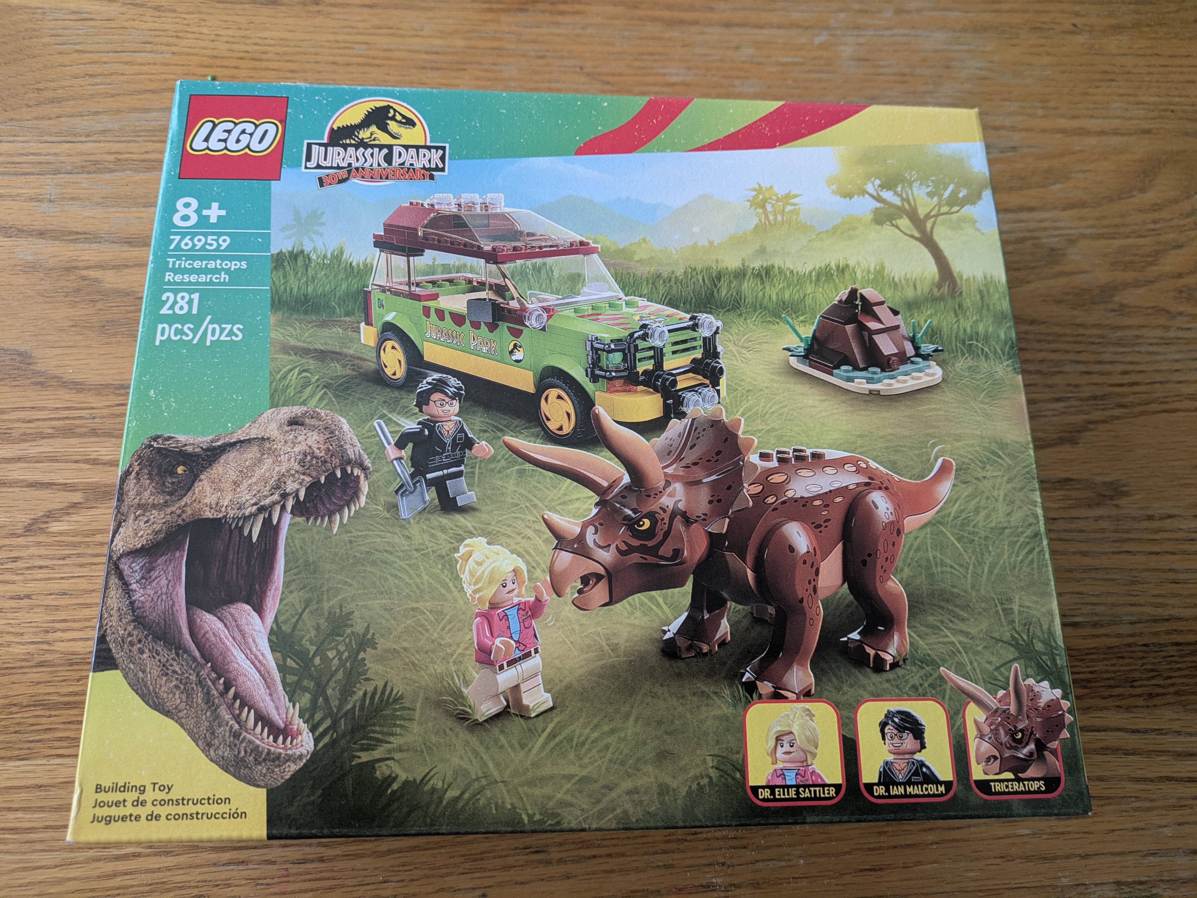 Sunday plans: Enjoying Jurassic Park while unwrapping my birthday gift!