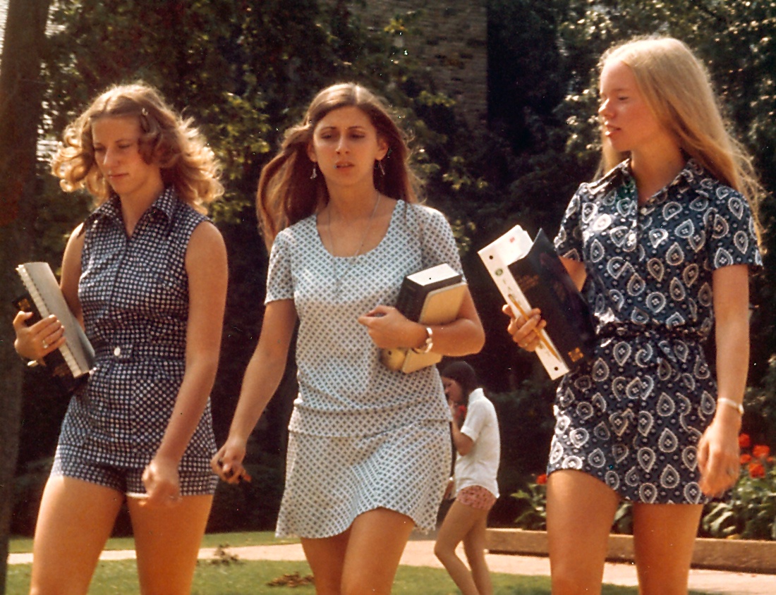 1970s college girls rocking three different mini styles: short shorts, mini skirts, and mini dresses