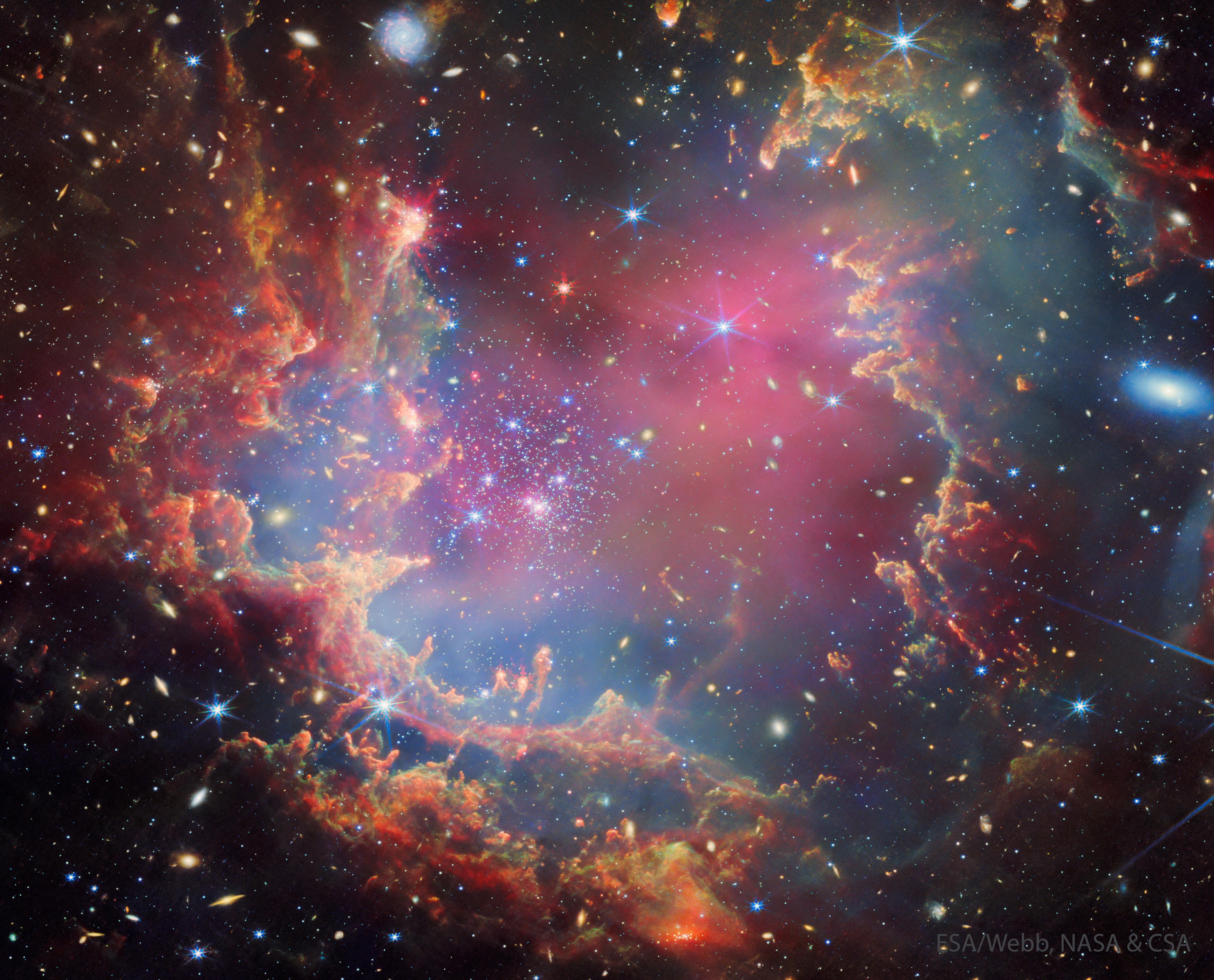NGC 602: The Epic Showdown Between Stars and Cosmic Pillars Captured by Webb