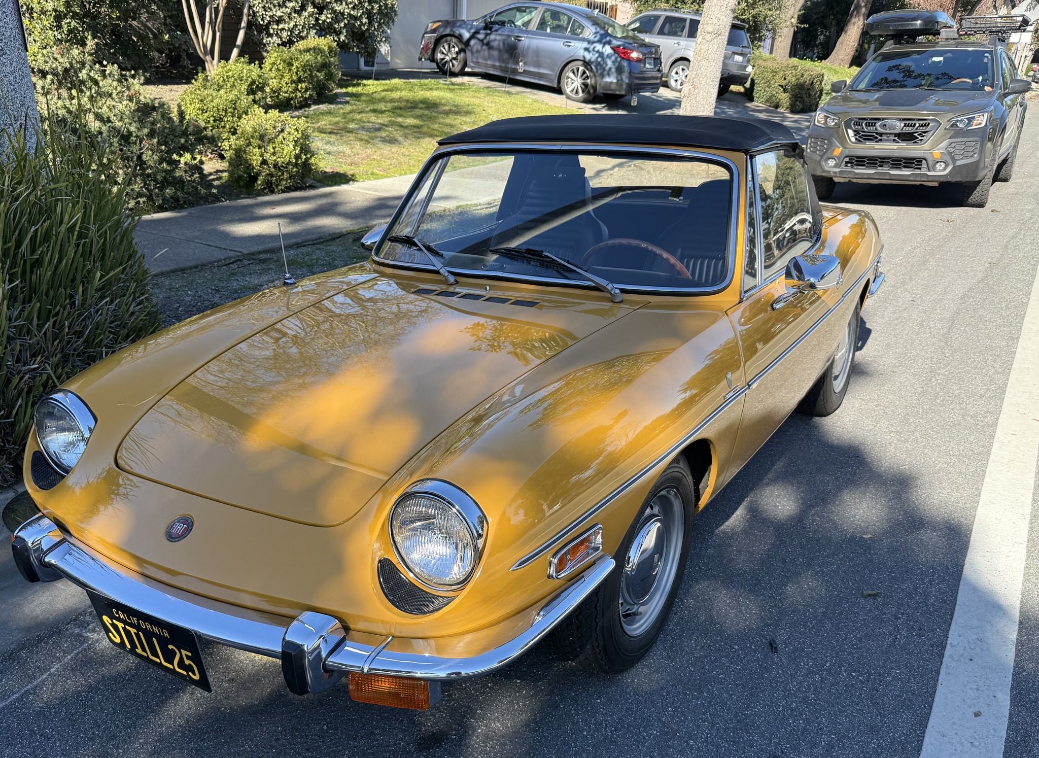 Today Features a Stunning Yellow Fiat 850 Sport Spider in Immaculate Condition