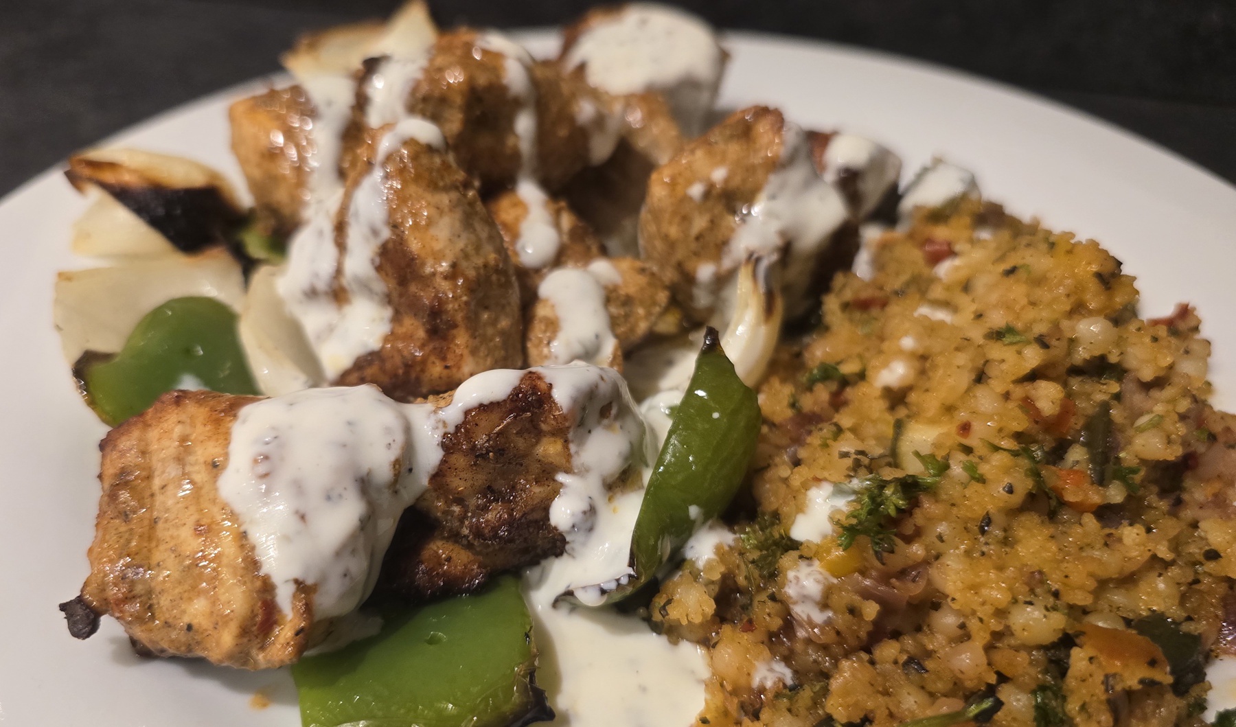 Savory Lebanese Chicken Kebabs with Couscous and Mint Yogurt Dressing