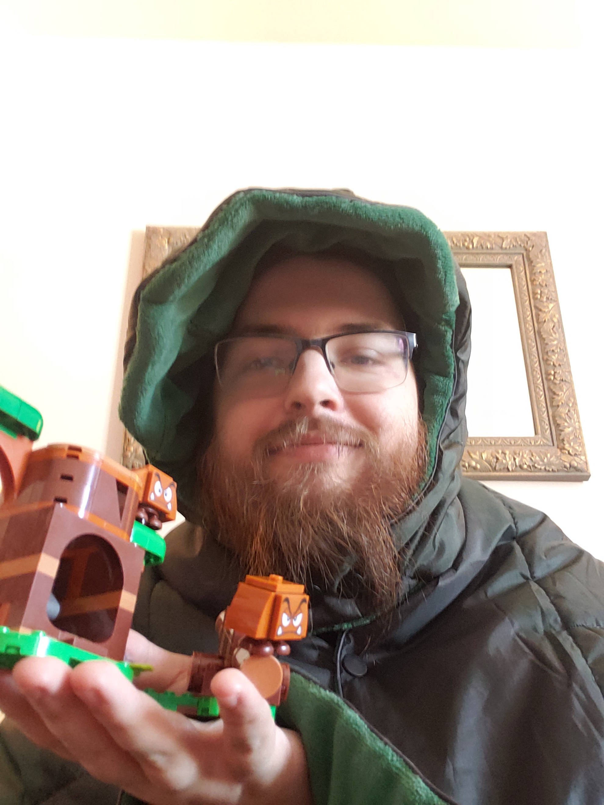 Snuggled up in a hooded blanket, feeling all warm and cozy this Christmas