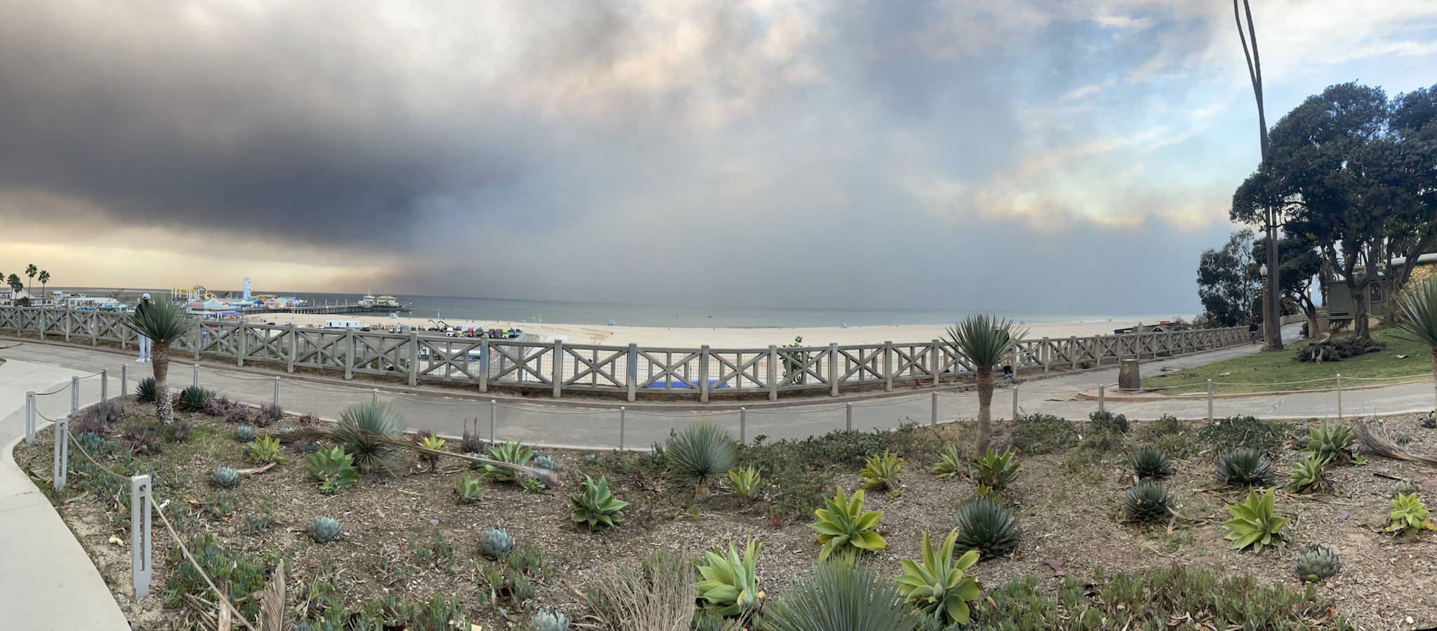 A breathtaking view of the Palisades Fire from Palisades Park, stretching from the pier to Malibu.