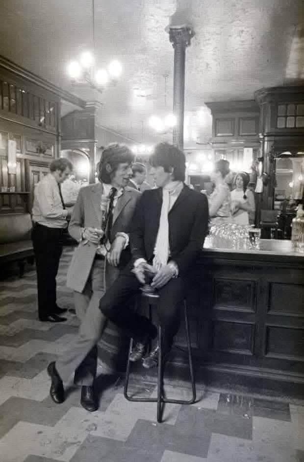 A nostalgic glimpse of Mick Jagger and Keith Richards enjoying the Salisbury Pub in Covent Garden during the 1960s