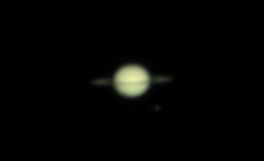 Witness the Moon Titan's Shadow Dance on Saturn in This 30-Minute Timelapse