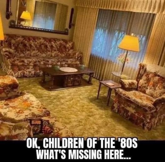 The Classic Combo: TV Trays, Ashtrays, and Plastic-Covered Couches