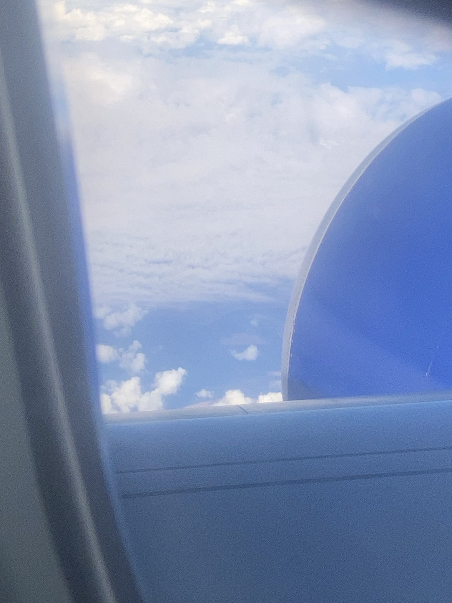 Fluffy clouds floating by