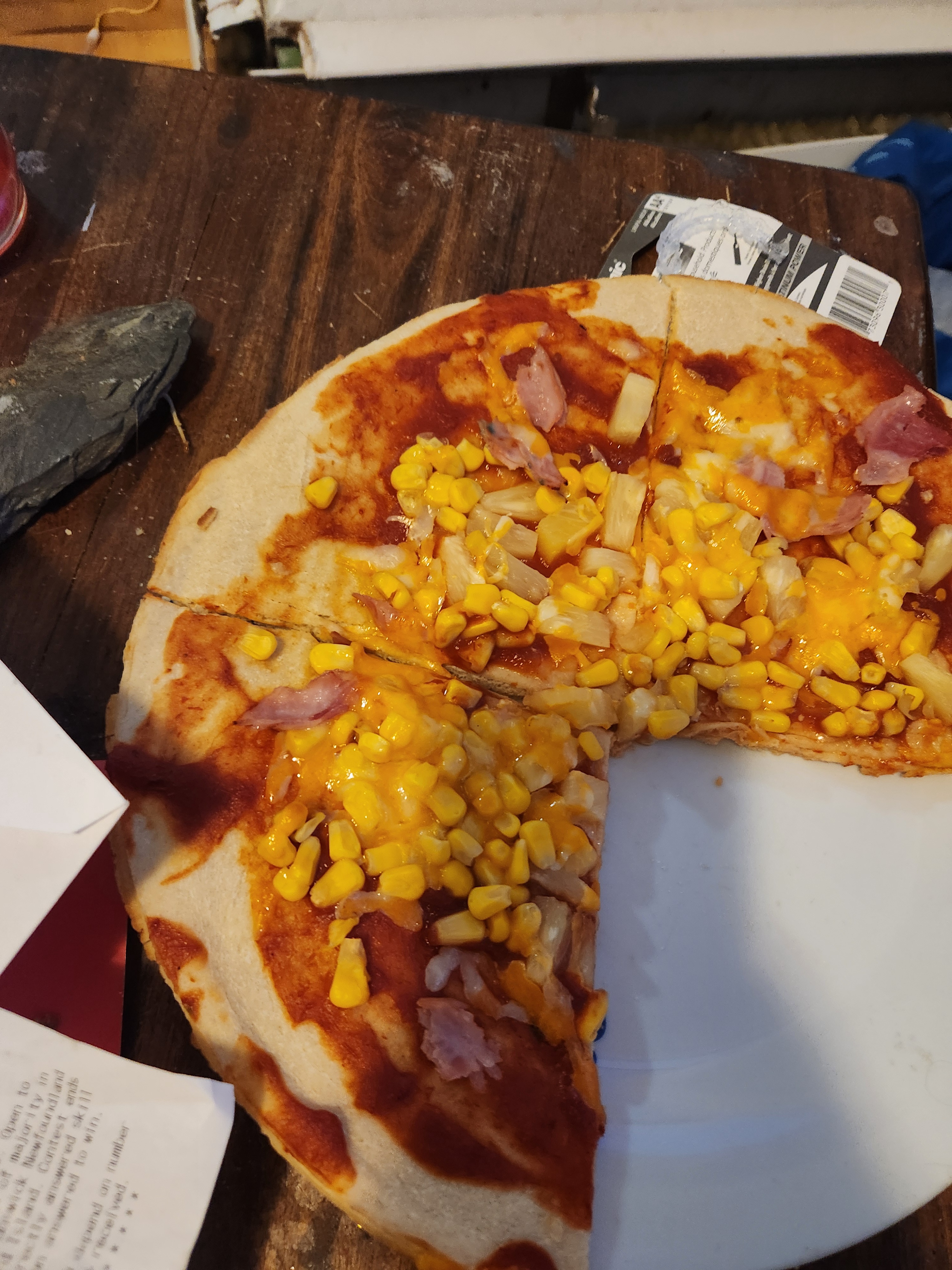 My Daughter's Unique Pizza Creation: Corn and Pineapple Delight