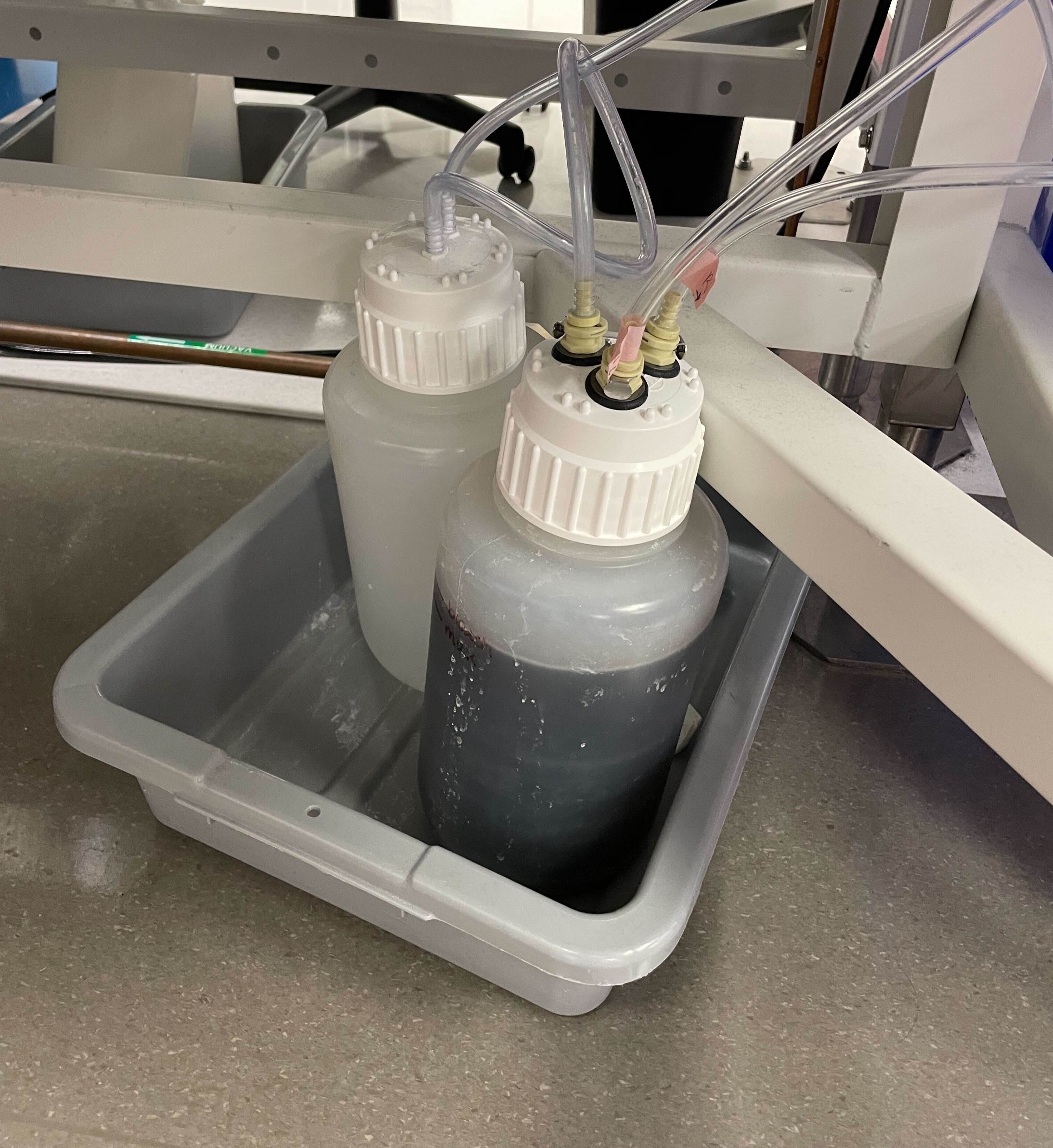 Mysterious Black Liquid in the Vacuum Trap