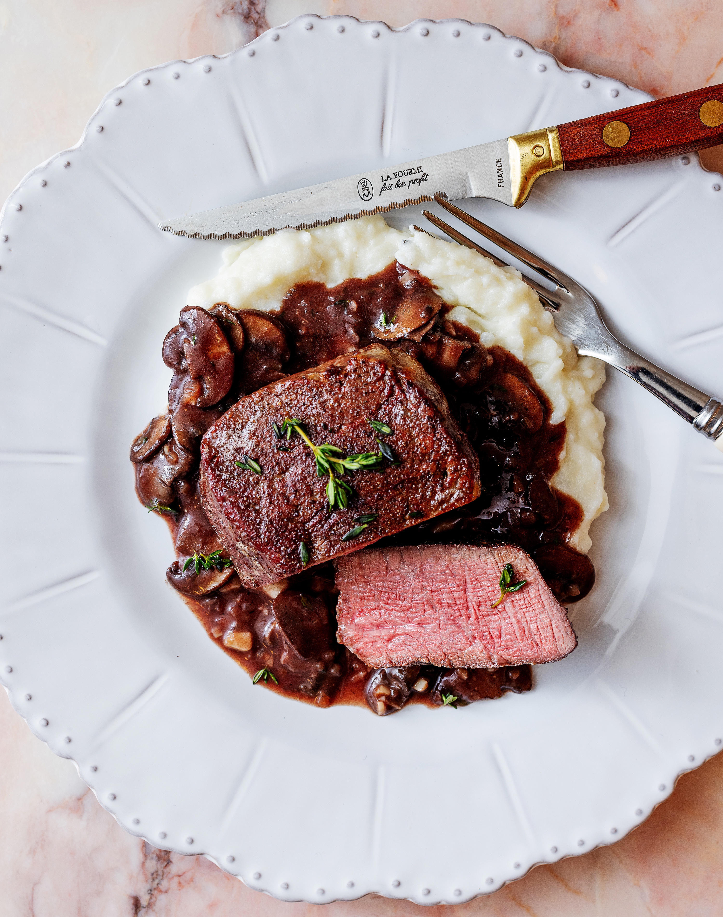 Indulge in Filet Mignon with a Rich Red Wine Mushroom Sauce!