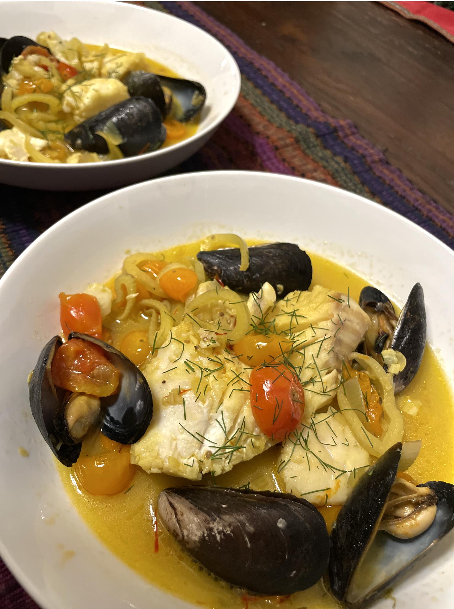 A Flavorful Medley: Saffron, Butter, Tomato, Fennel, Seafood, and Fish