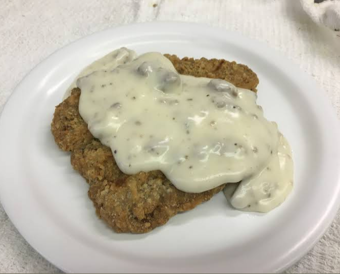 Indulging in some delicious country fried steak!