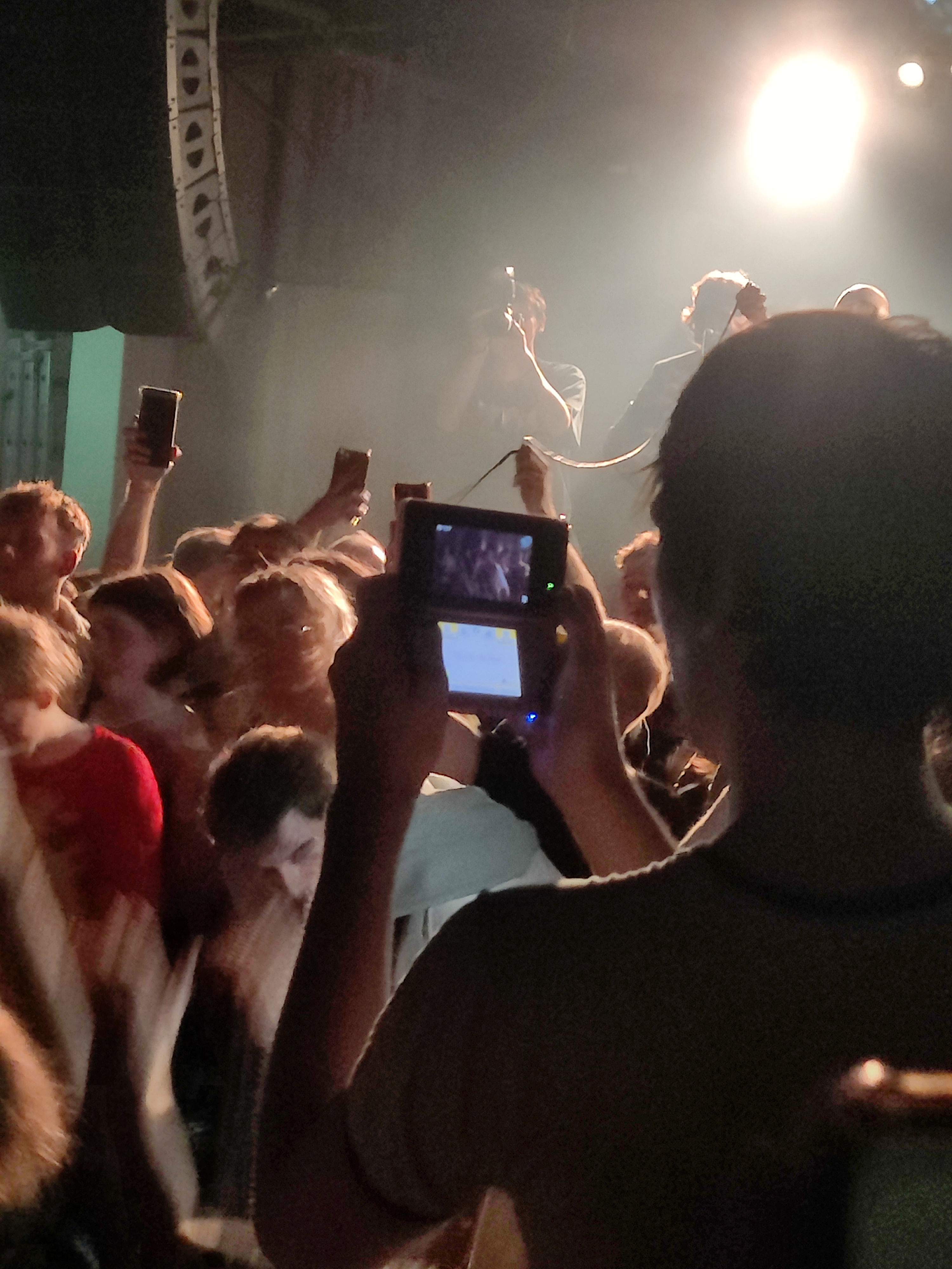 The Guy at Last Night's Gig Capturing Memories on His DS