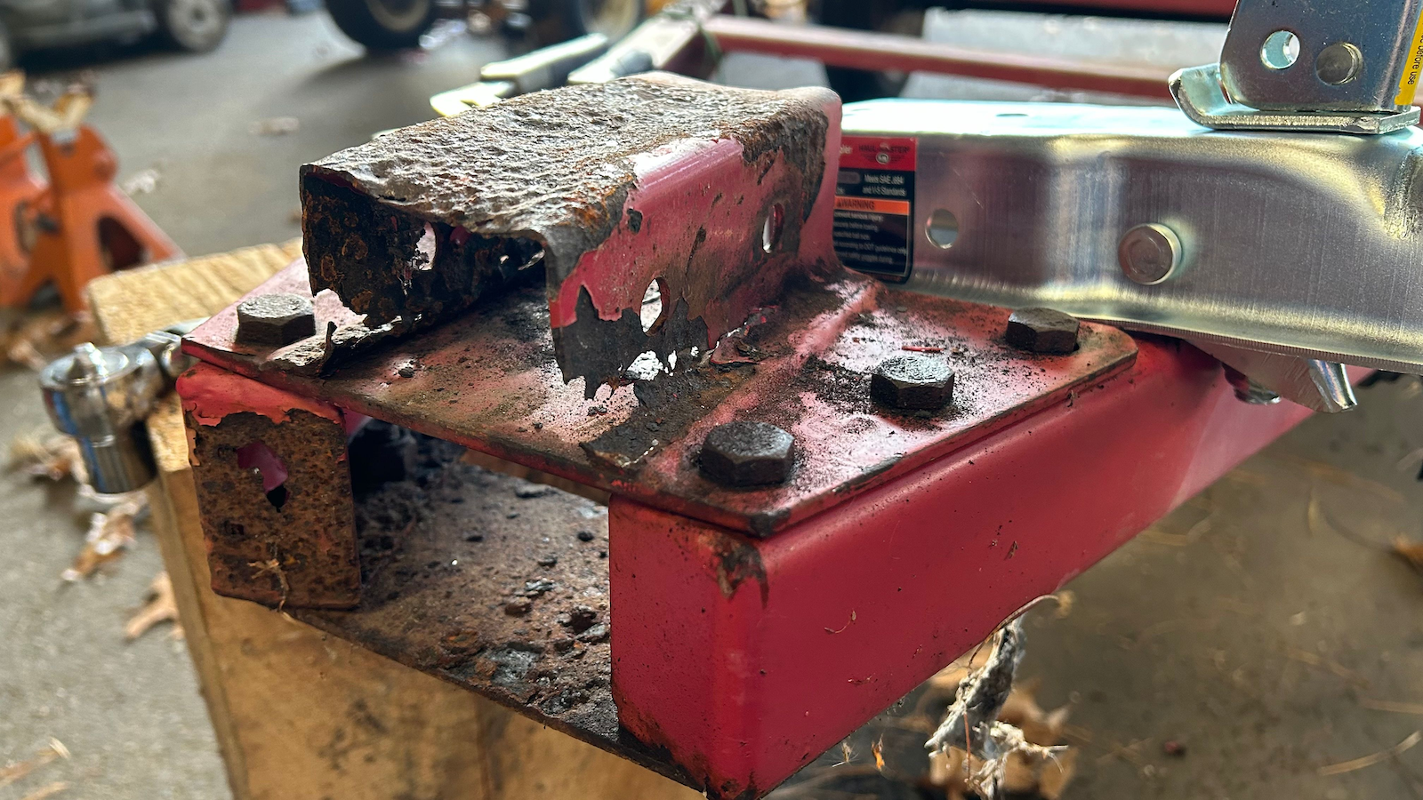 A Rusty Hitch Plate on an Old Trailer: What a Sight!