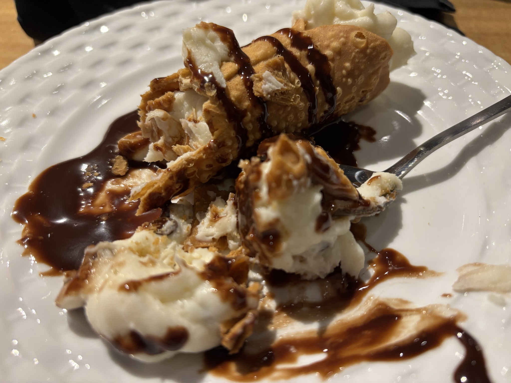 Indulging in cannoli at Luigi's in Coppell