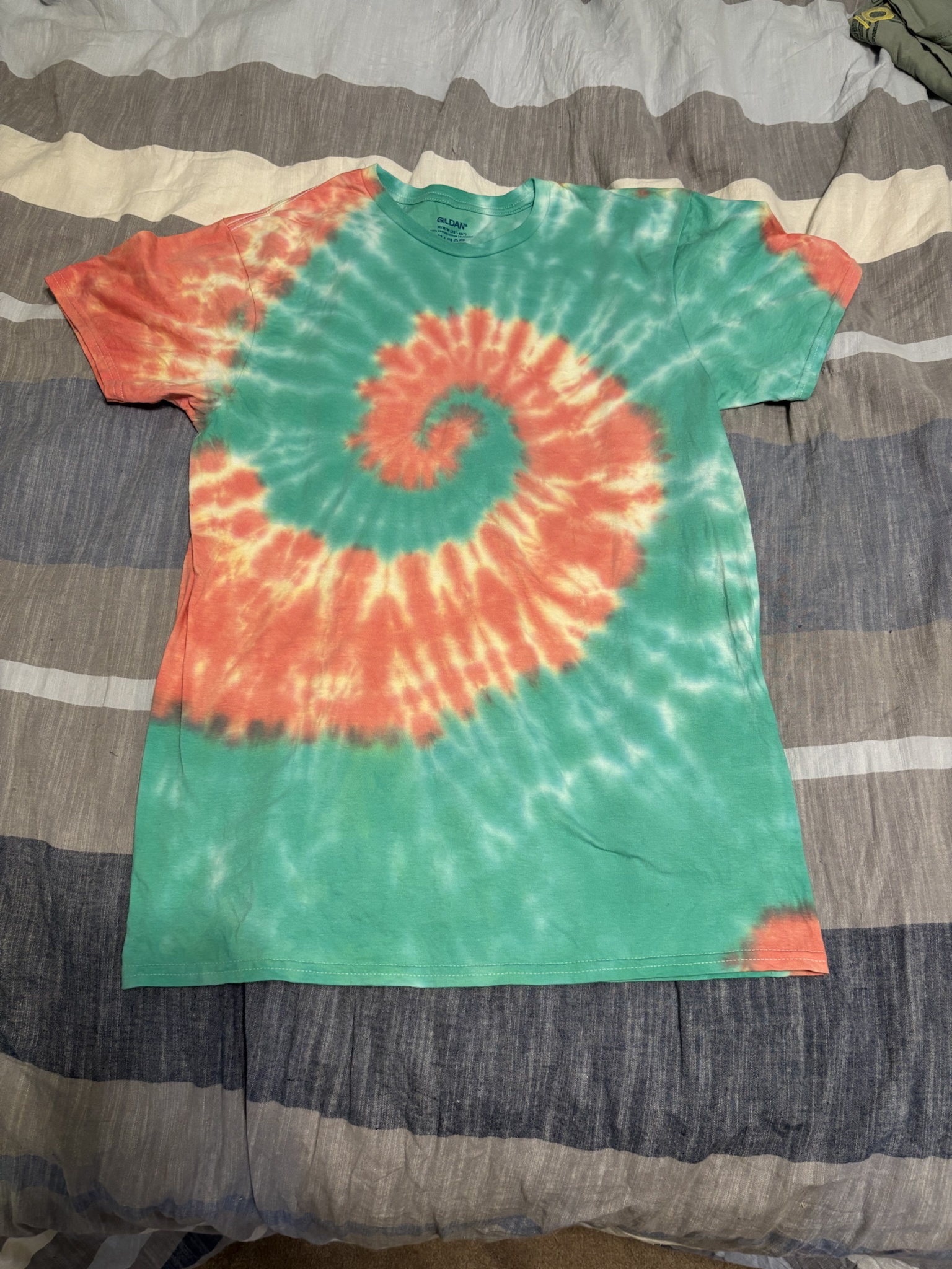A Festive Blend of Green and Red Tie-Dye Creations