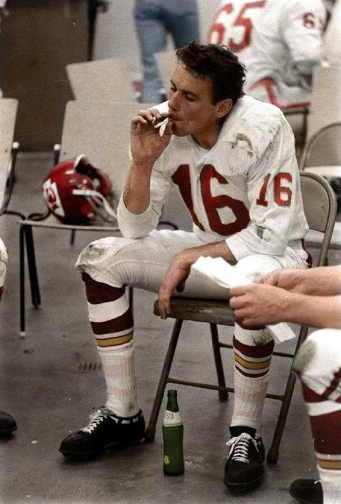 Len Dawson, the Chiefs' Legendary Quarterback, Relaxes with a Fresca and a Cigarette During Super Bowl 1 Halftime - A Glimpse into a Different Era