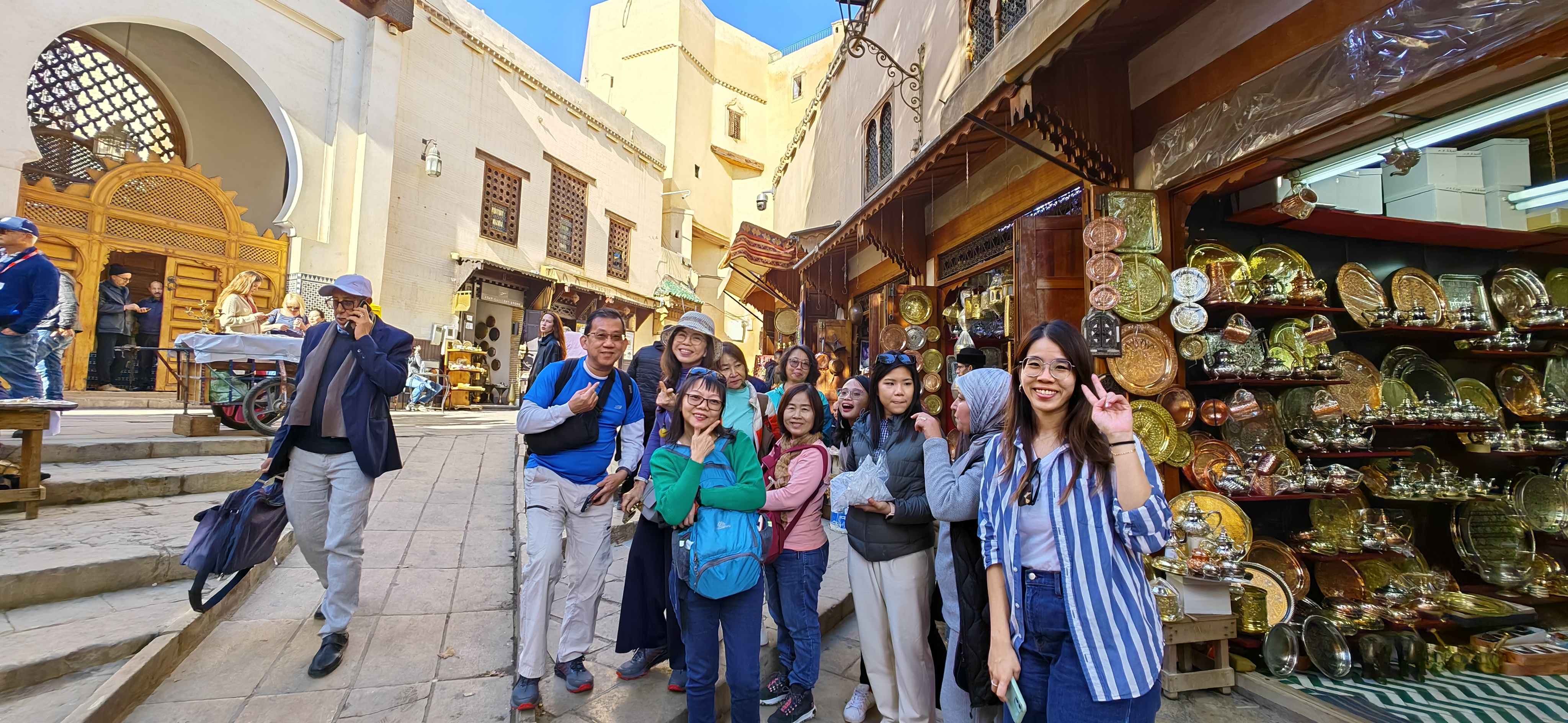 Day 2 - Fez Medina, Morocco - Witness the timeless craftsmanship of Moroccan artisans creating breathtaking brass and copper pieces using traditional hand-hammering and engraving techniques, showcasing the city's rich artistic heritage.