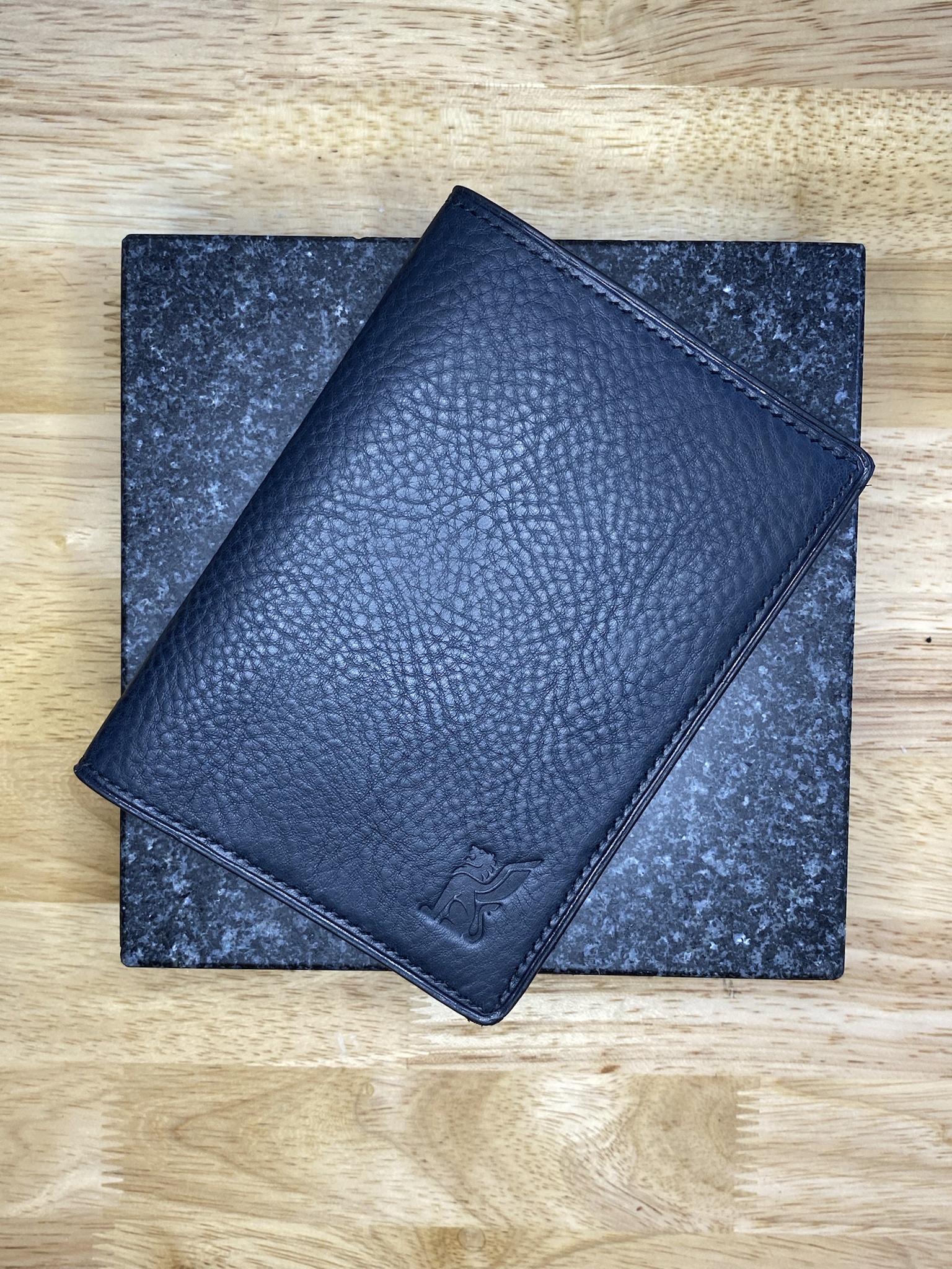 Does sewing leather count? Check out my hand-stitched work with 3mm spacing and Vinymo #8 thread!