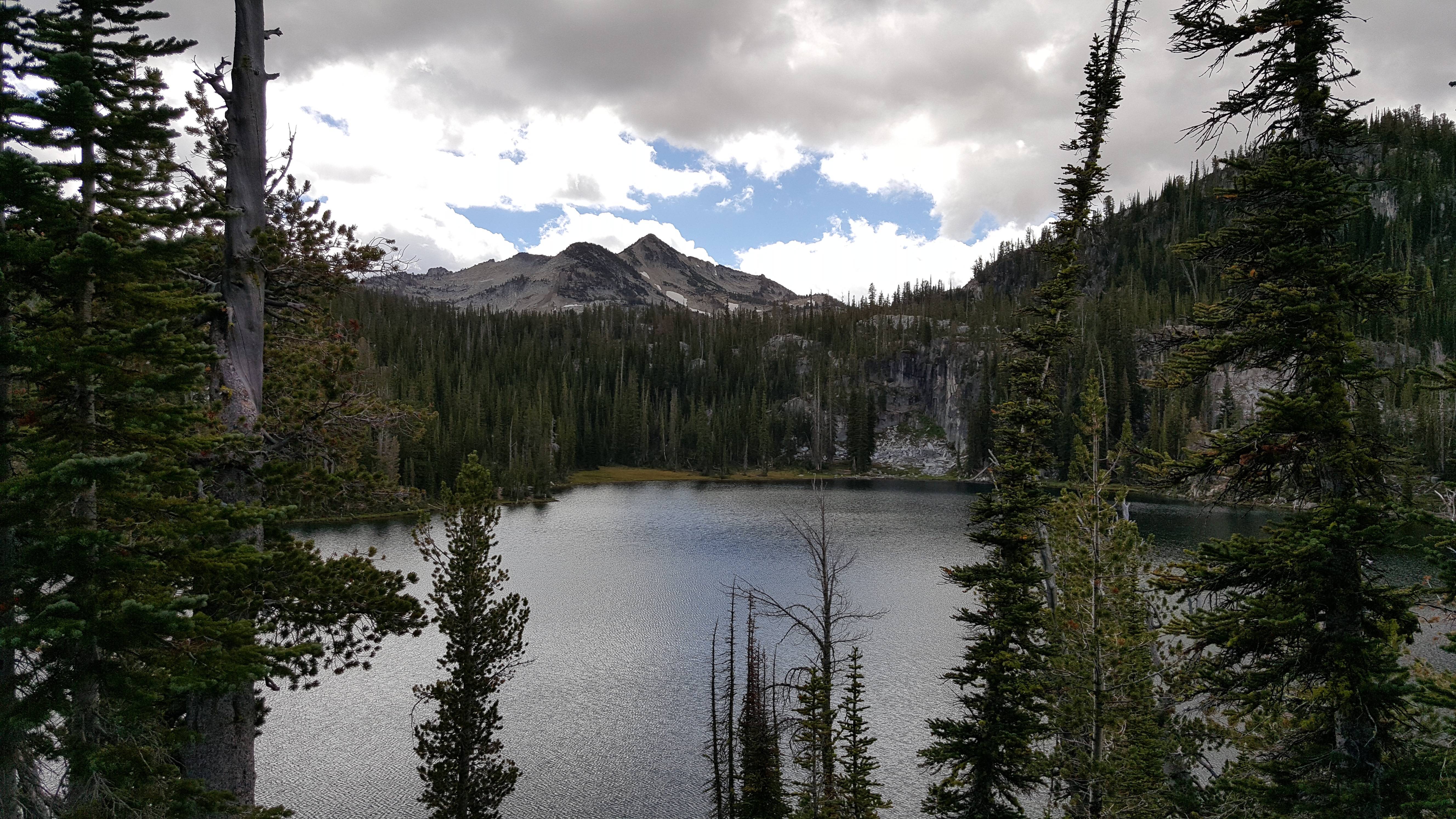 Breathtaking views of an alpine lake nestled in the Eagle Cap Wilderness, Wallowa Mountains, Oregon