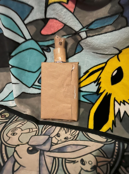 2024 Christmas Surprise: A Perfume-Shaped Gift Wrap
