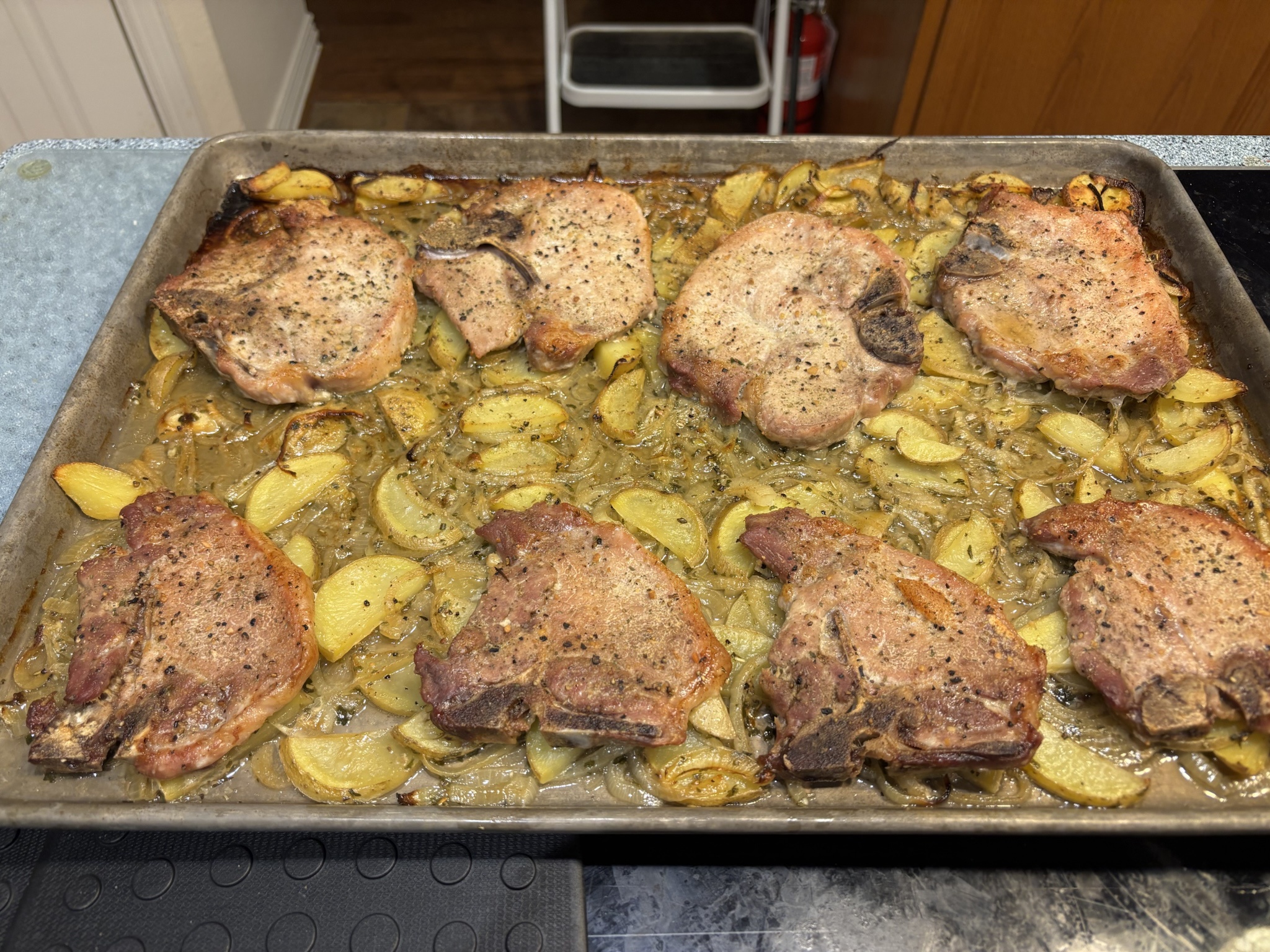 Tonight's Dinner: EZ-Baked Pork Chops with Potatoes, Onions, and Steamed Cauliflower