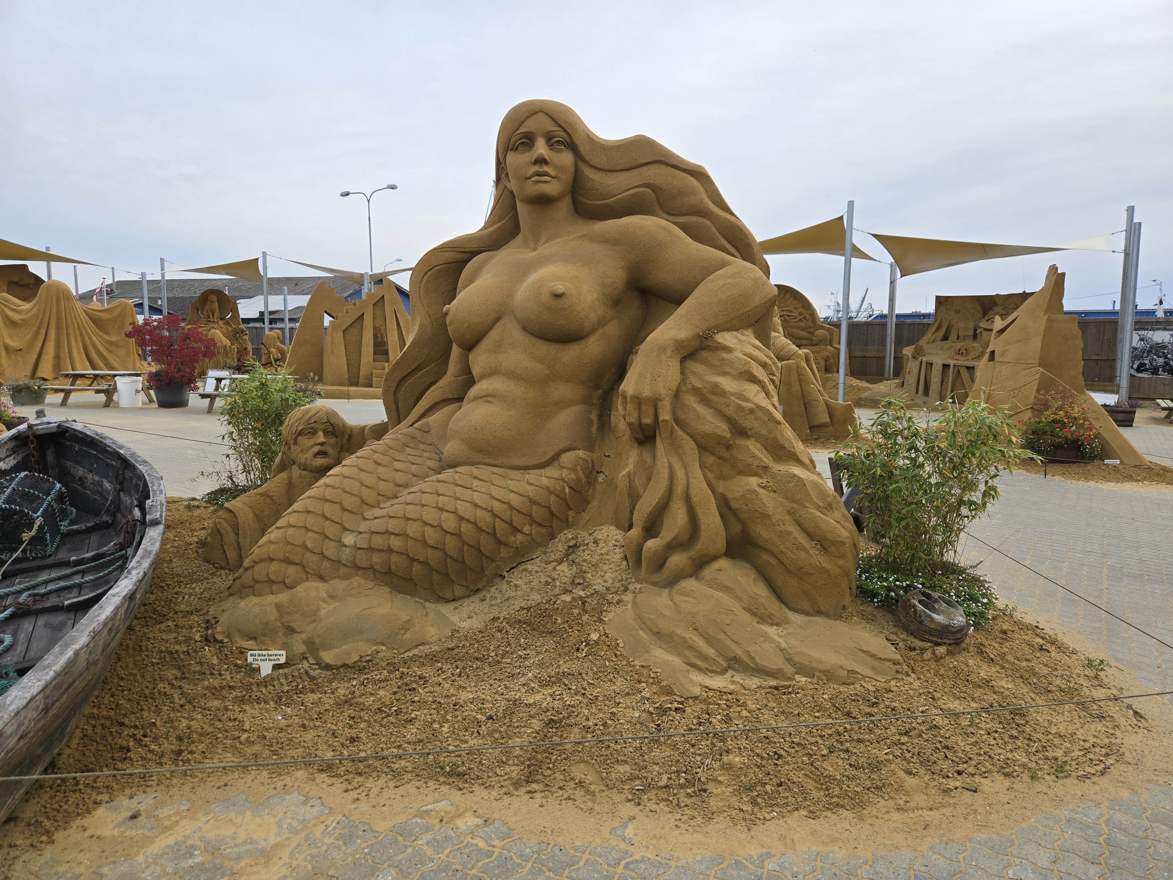 A stunning duo of intricate sand sculptures.