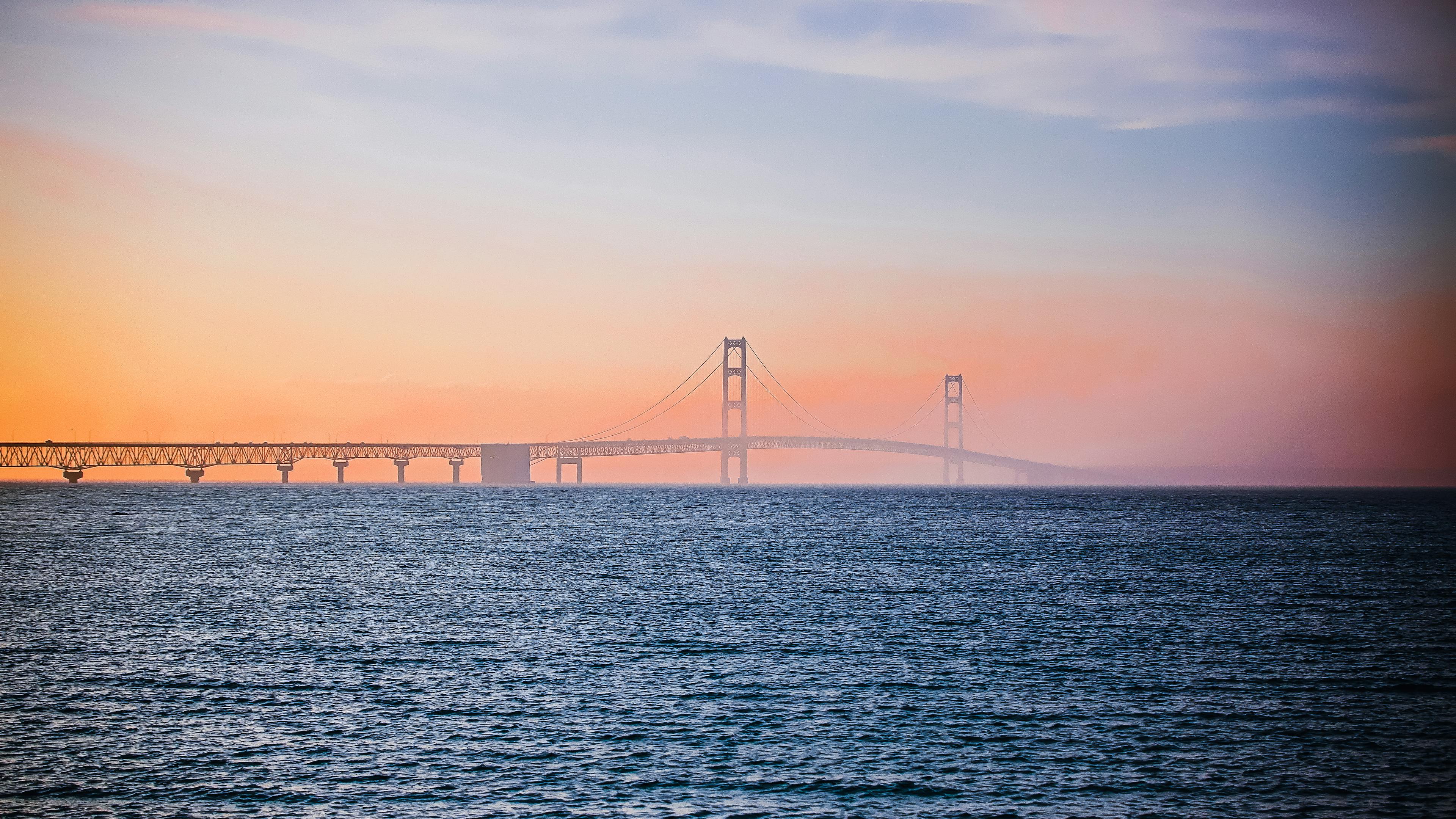 Breathtaking sunset reflections at Mackinac Bridge.