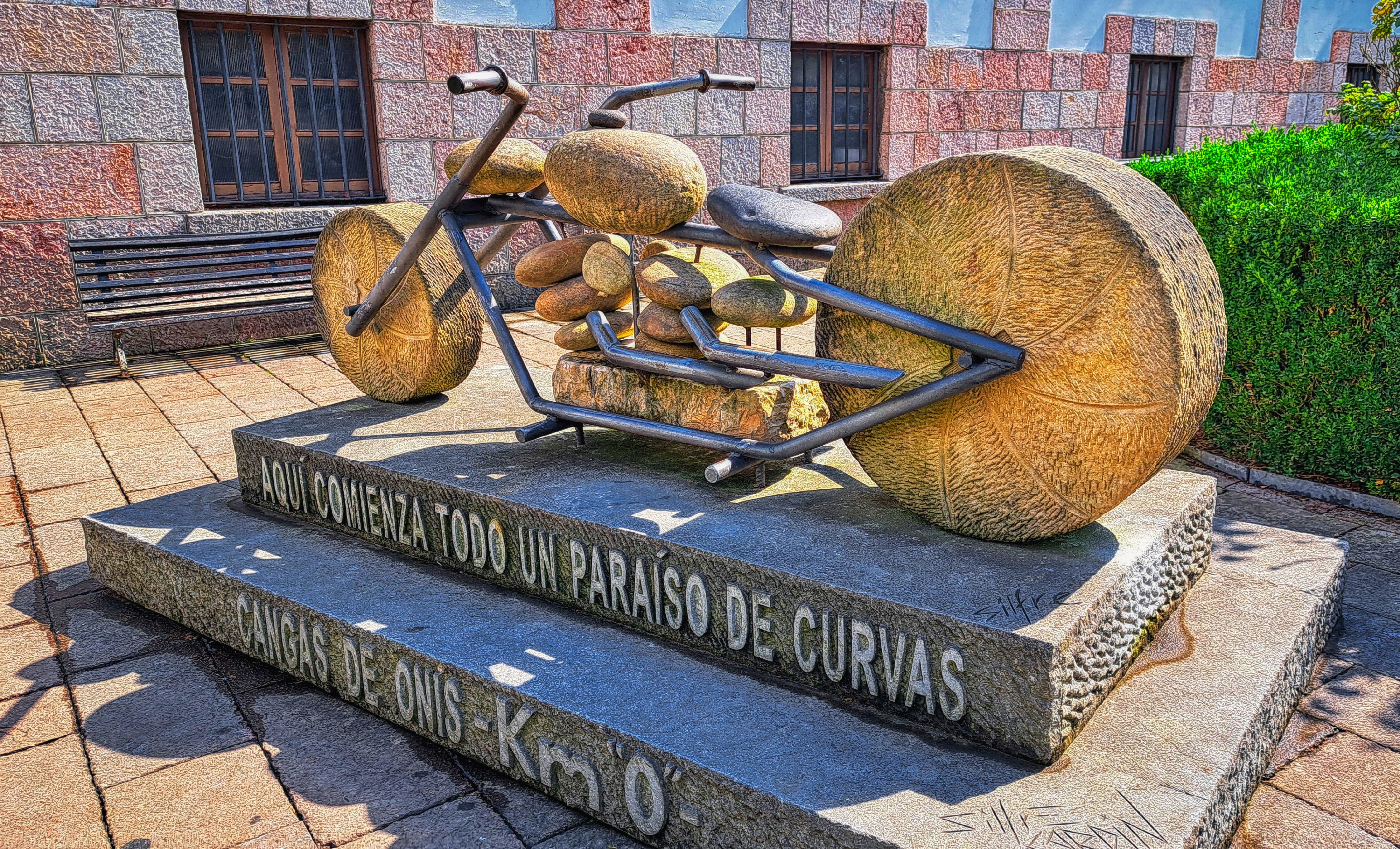 Cangas d'Onís: Stone Motorcycle Sculpture in Asturias