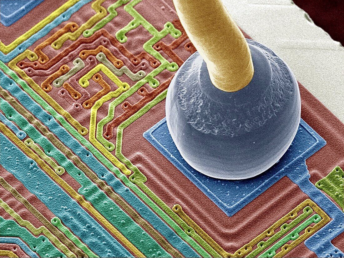 Close-Up of a Micro-Wire Bonded to a Silicon Chip at 400x Magnification