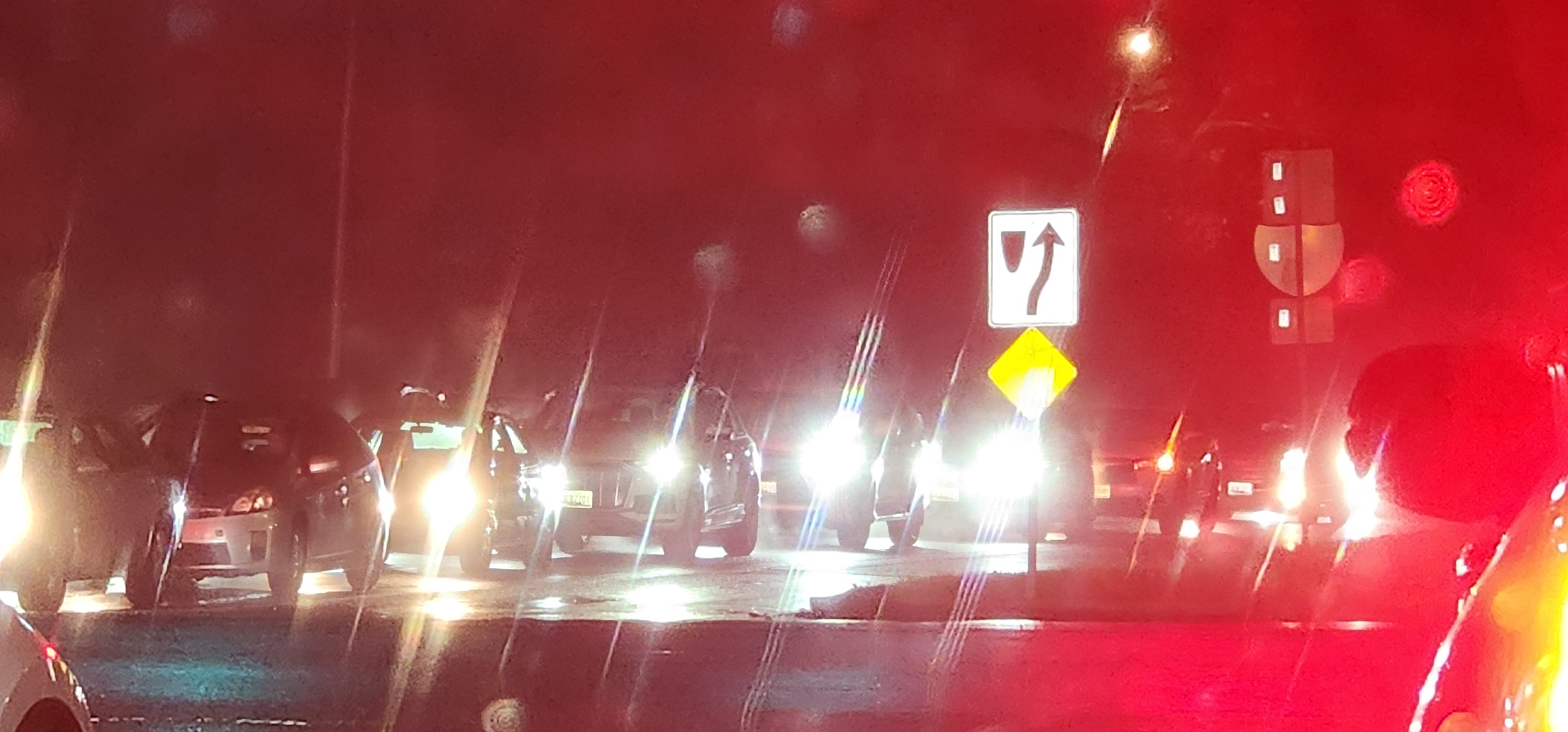 A Friendly Reminder: Turn on Your Headlights at Night and in Rain