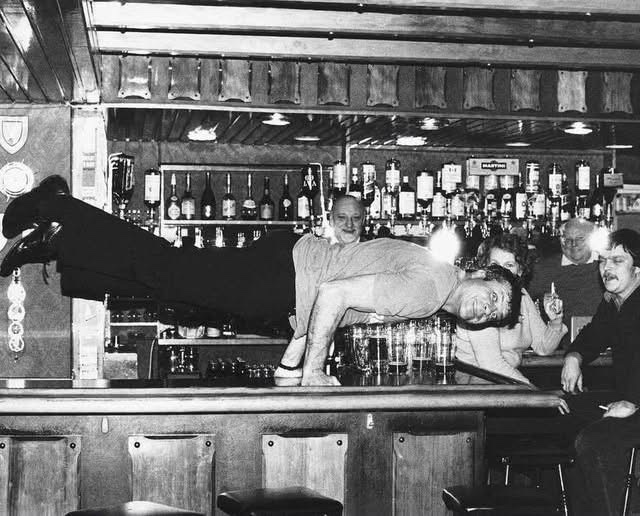 Oliver Reed Showing Off His Strength with Press Ups at the Jamaica Inn During Lion of the Desert Filming in February 1979