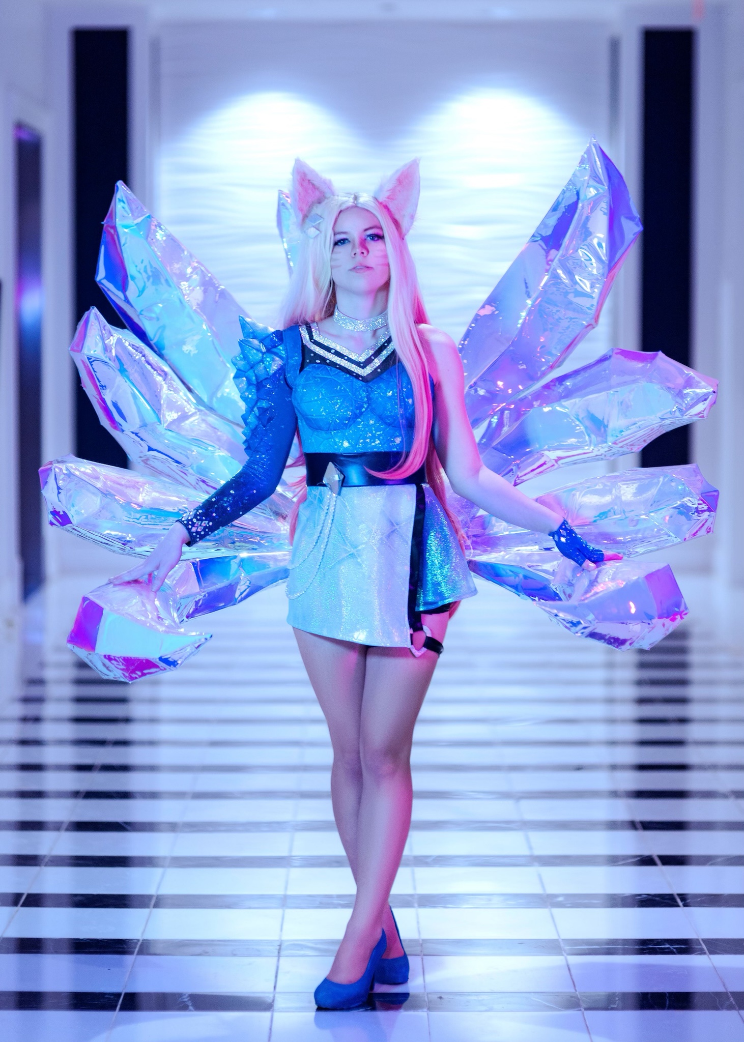 KDA Ahri cosplay brought to life by electric seafoam